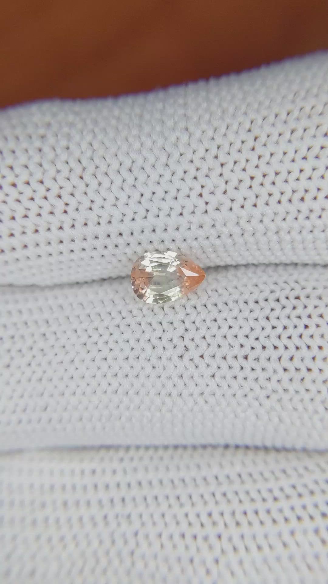 0.67 Ct. Peach Sapphire from Ceylon (Sri Lanka) Size Video