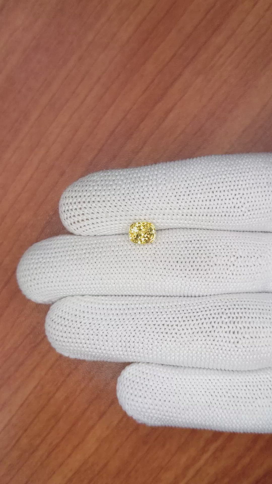 1.76 Ct. Orangish Yellow Sapphire from Ceylon (Sri Lanka) Size Video