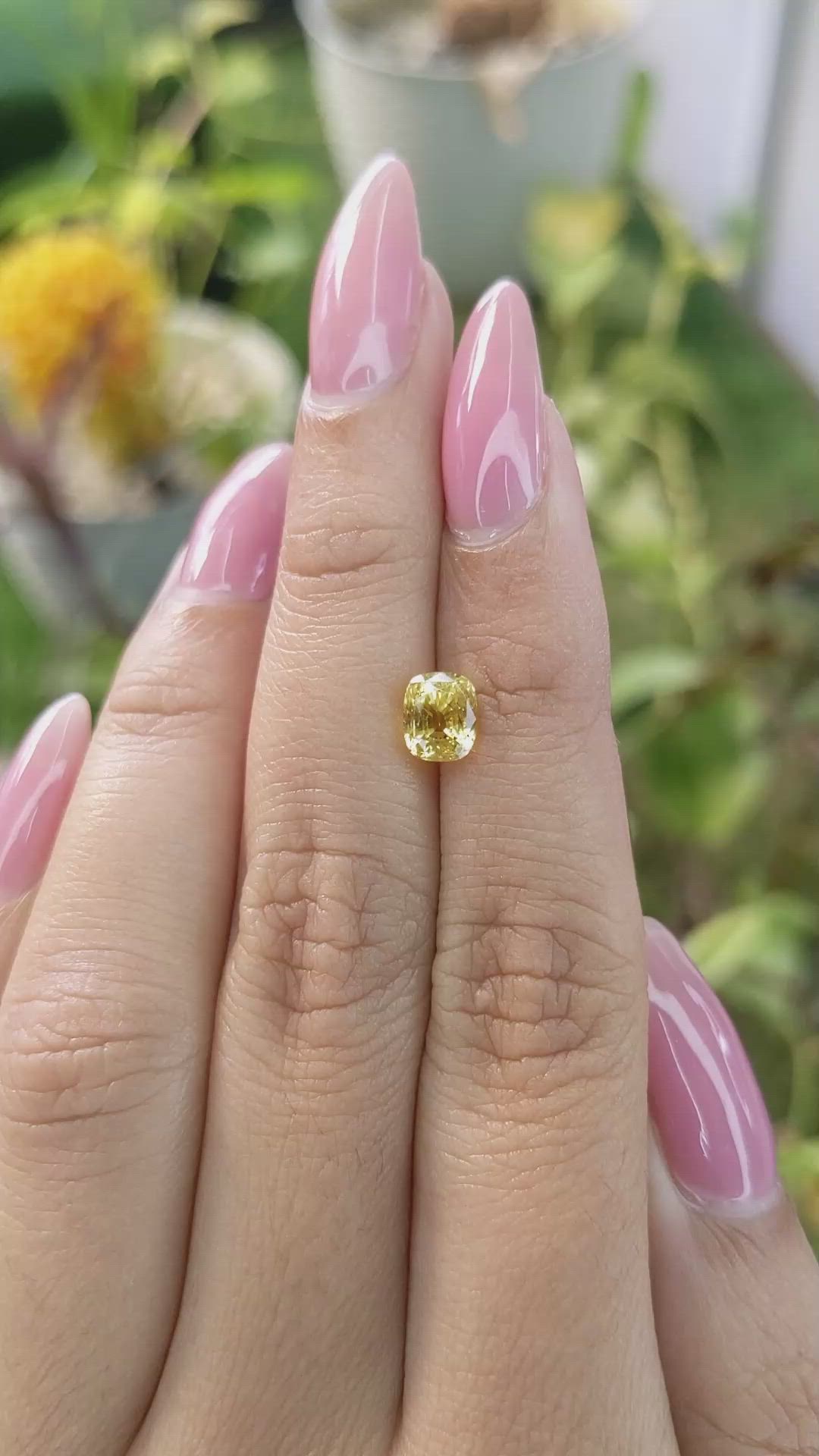 1.76 Ct. Orangish Yellow Sapphire from Ceylon (Sri Lanka) Size Video