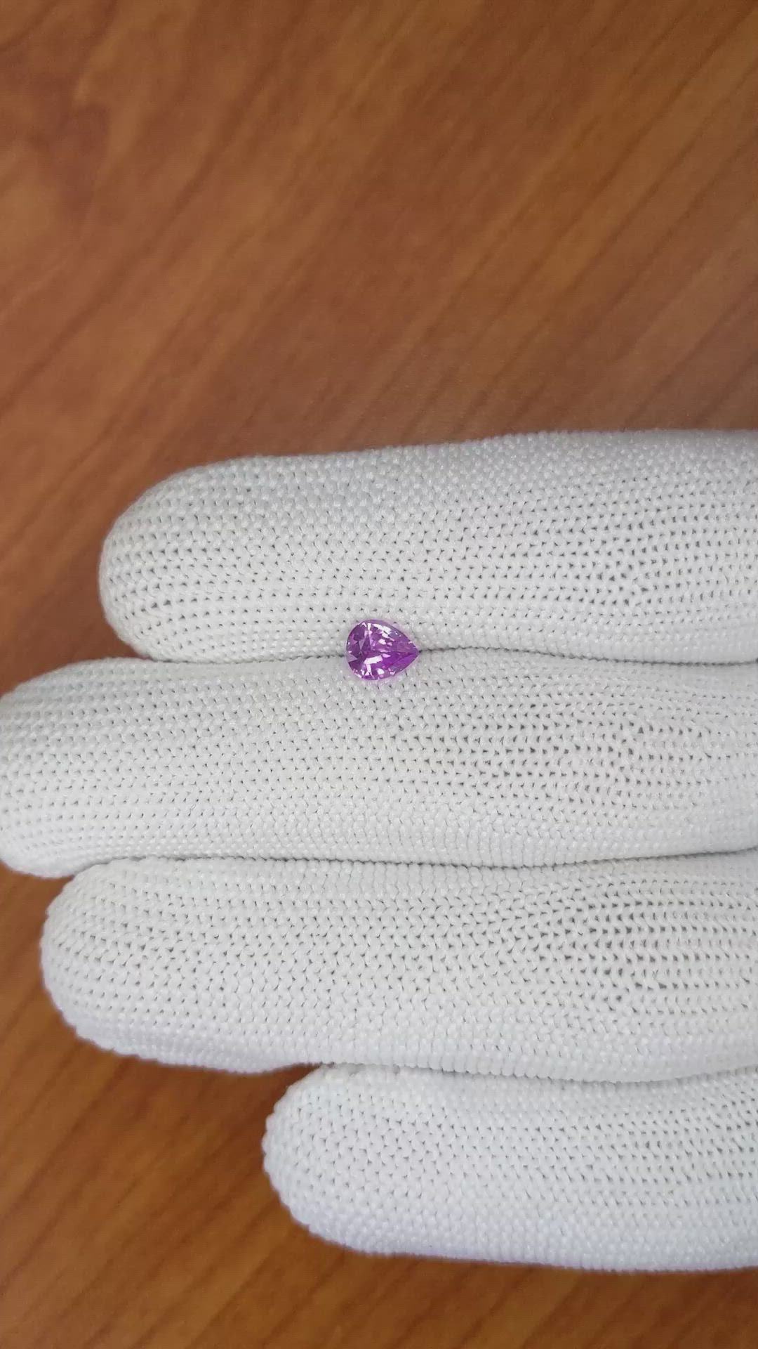 0.64 Ct. Purplish Pink Sapphire from Ceylon (Sri Lanka) Size Video