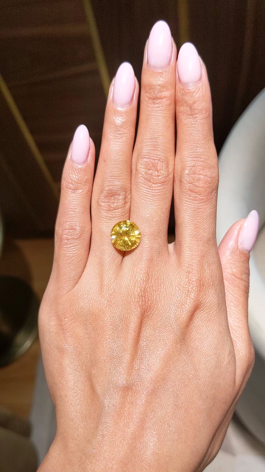 8.11 Ct. Orangish Yellow Sapphire from Ceylon (Sri Lanka) Size Video