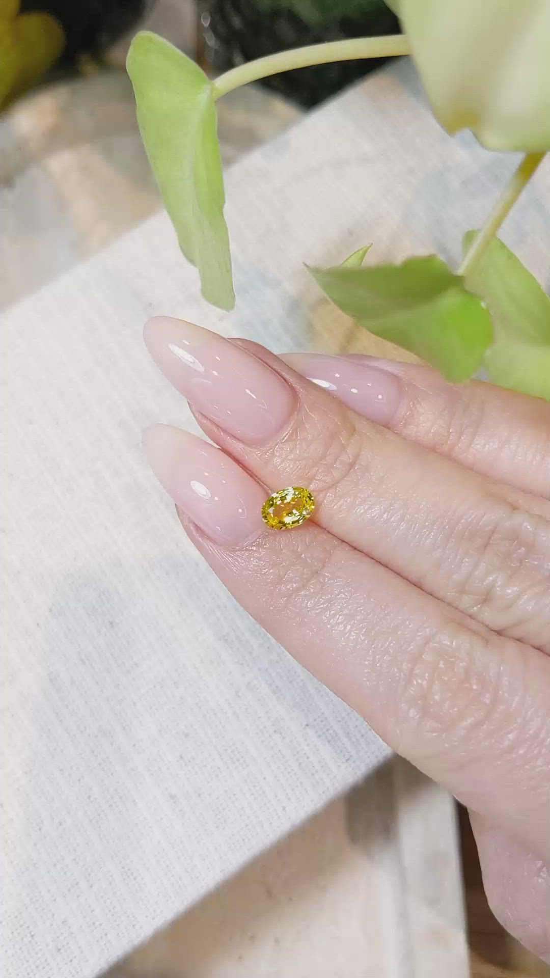 0.74 Ct. Orangish Yellow Sapphire from Ceylon (Sri Lanka) Size Video