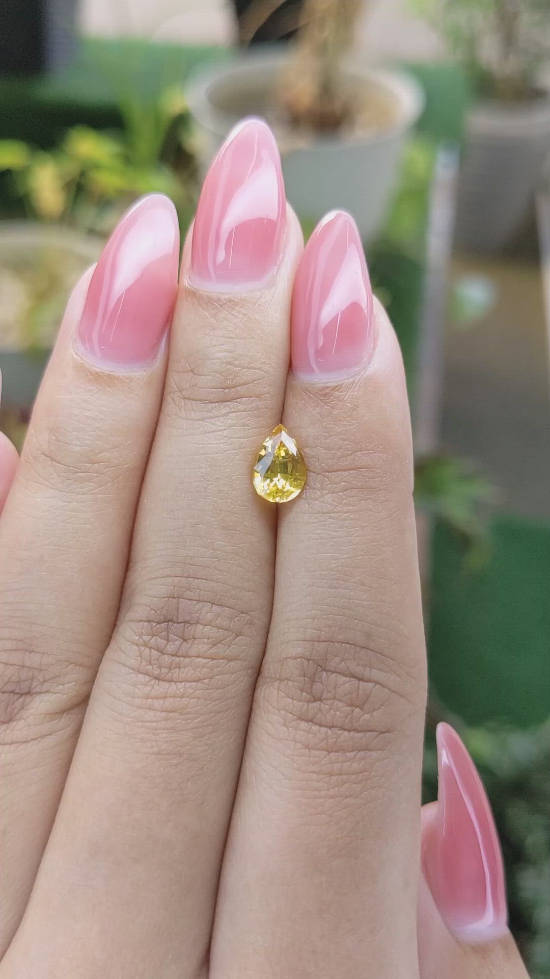 1.31 Ct. Orangish Yellow Sapphire from Ceylon (Sri Lanka) Size Video