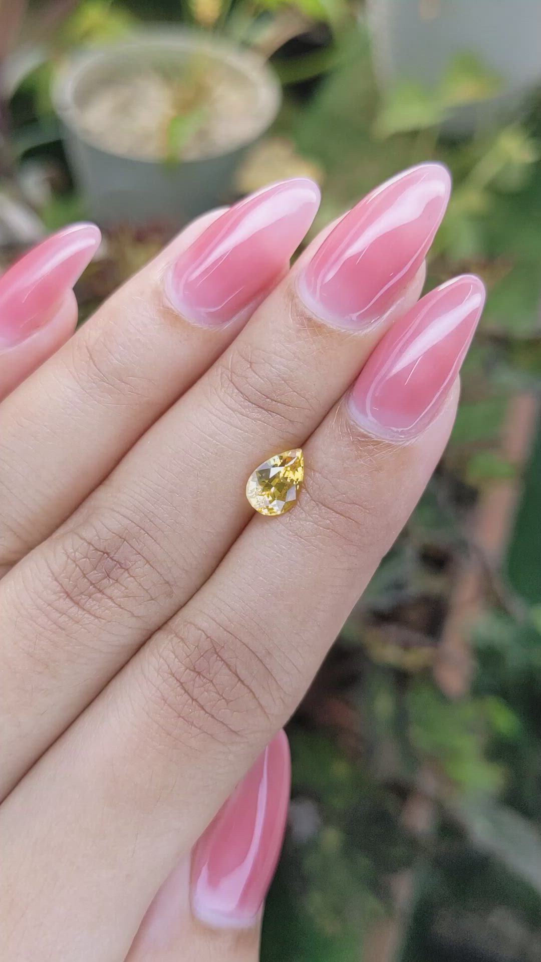 1.31 Ct. Orangish Yellow Sapphire from Ceylon (Sri Lanka) Size Video