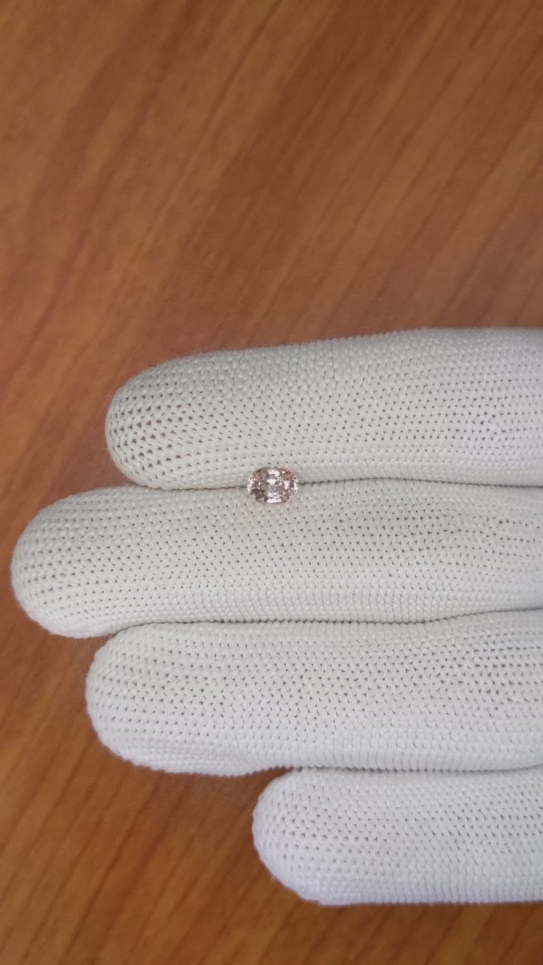 0.62 Ct. Peach Sapphire from Ceylon (Sri Lanka) Size Video