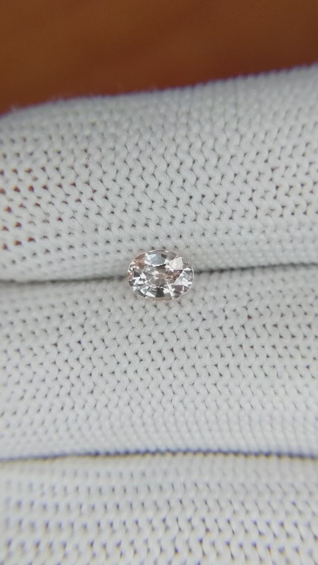 0.62 Ct. Peach Sapphire from Ceylon (Sri Lanka) Size Video