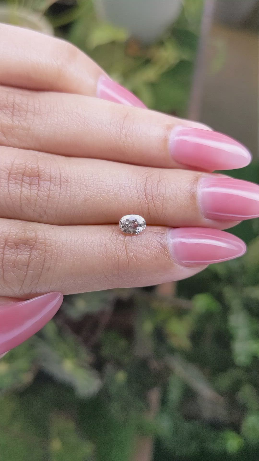 0.62 Ct. Peach Sapphire from Ceylon (Sri Lanka) Size Video