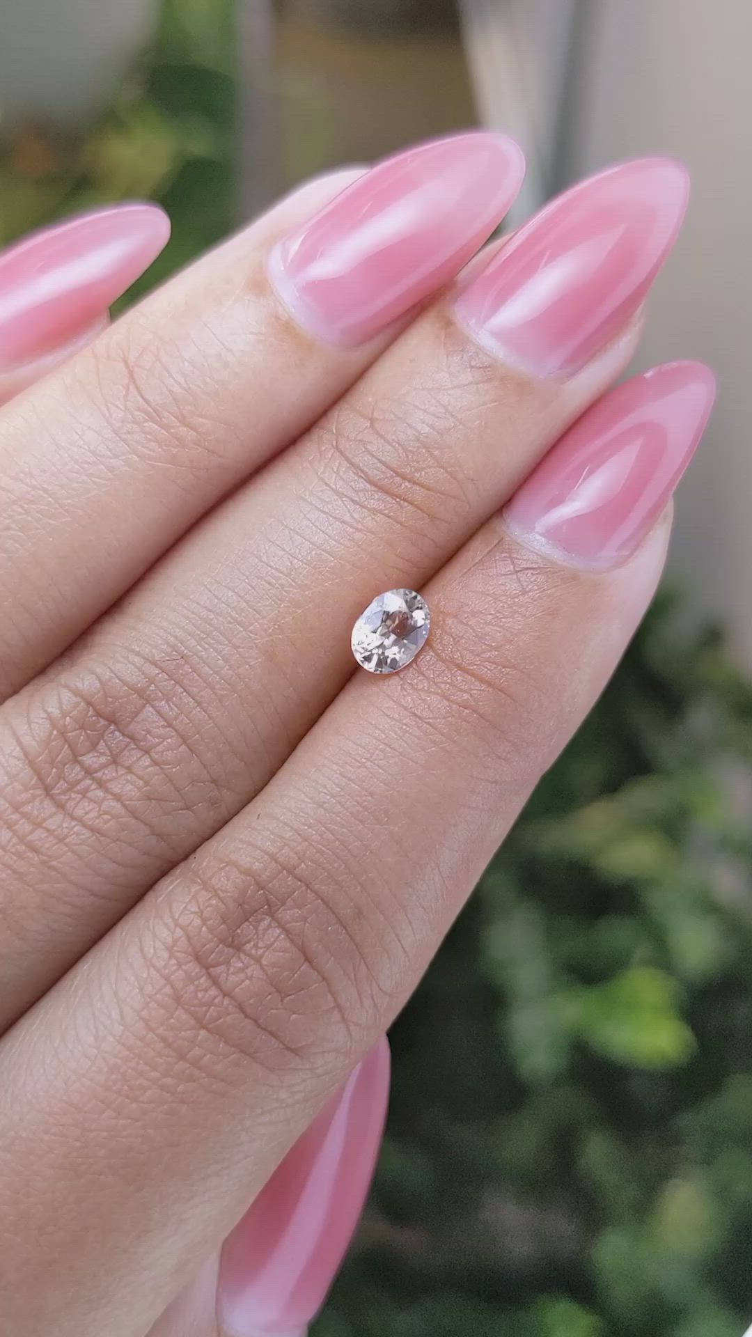 0.62 Ct. Peach Sapphire from Ceylon (Sri Lanka) Size Video