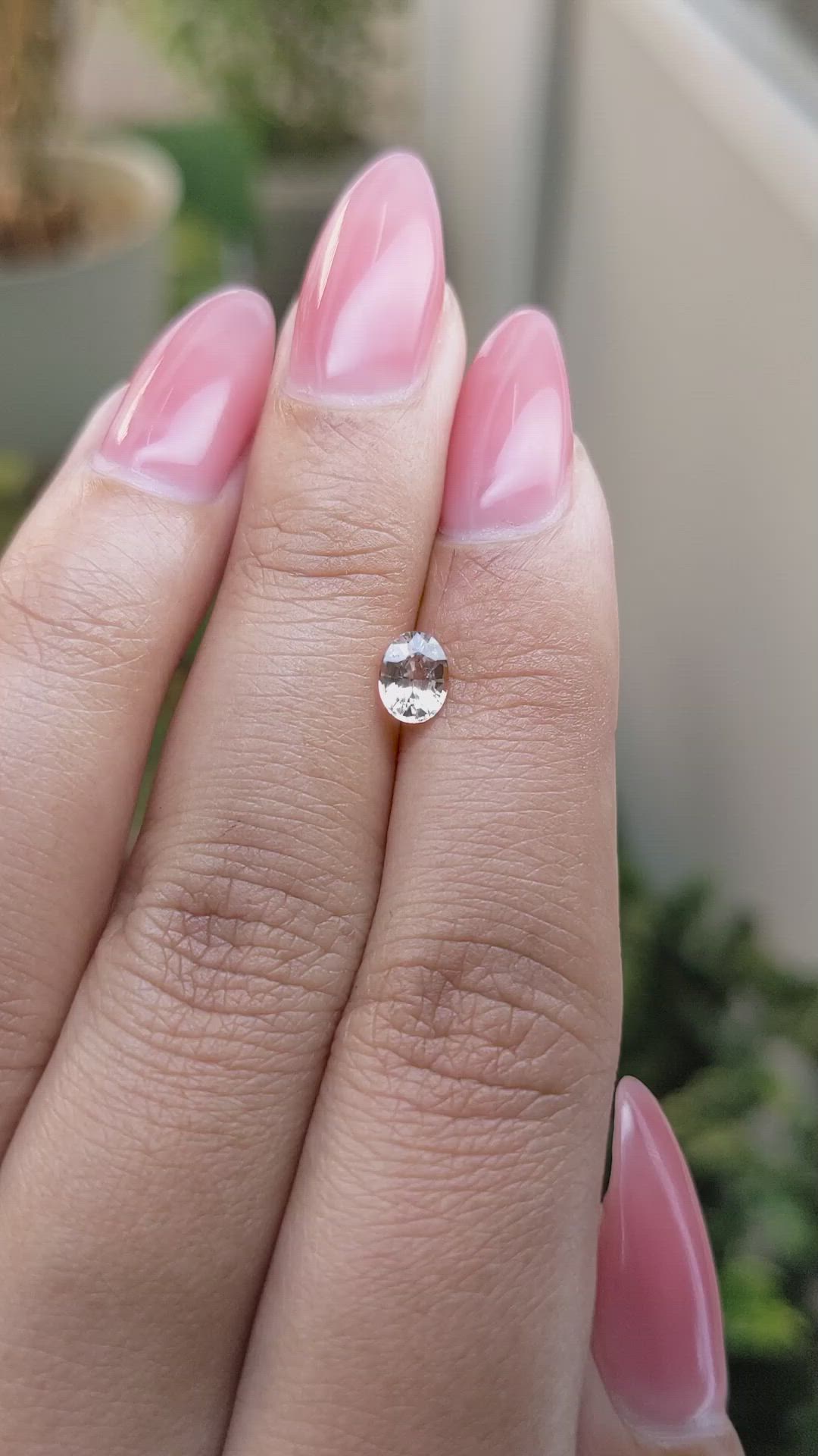 0.62 Ct. Peach Sapphire from Ceylon (Sri Lanka) Size Video