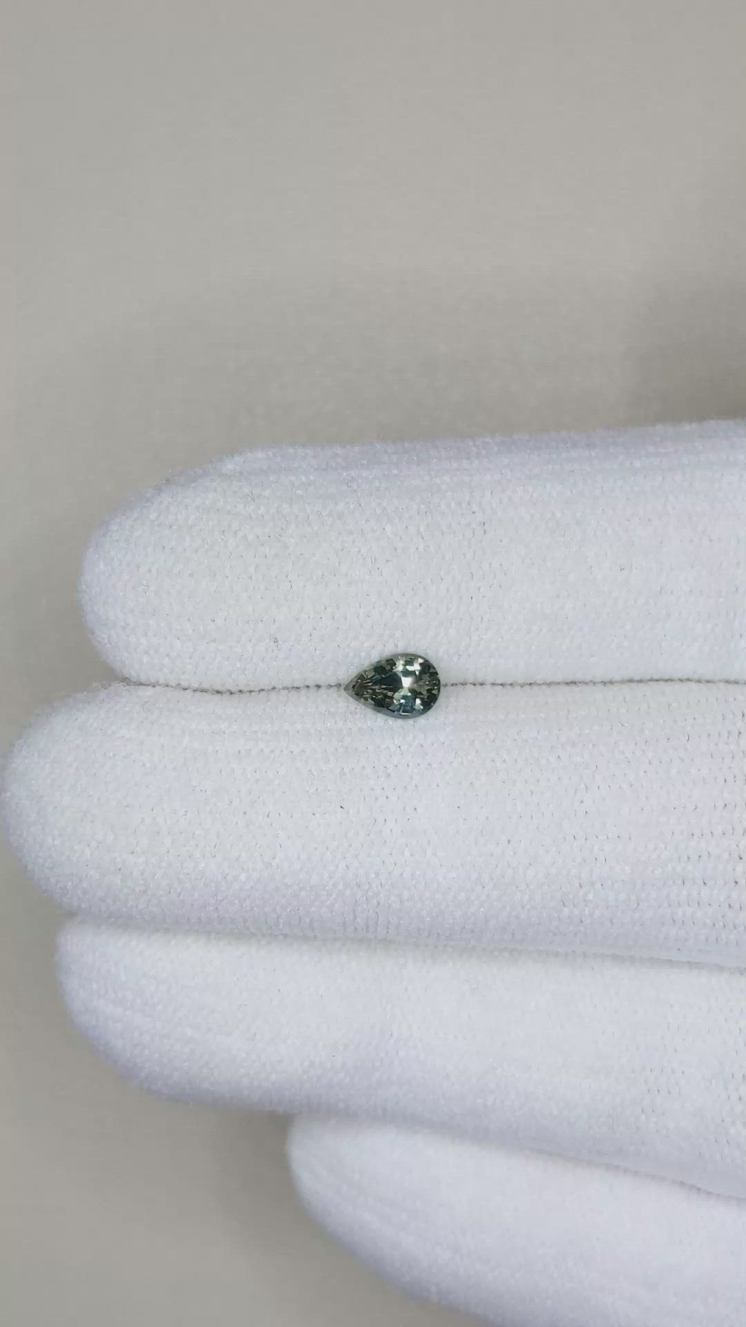0.38 Ct. Bluish Green Sapphire from Madagascar Size Video