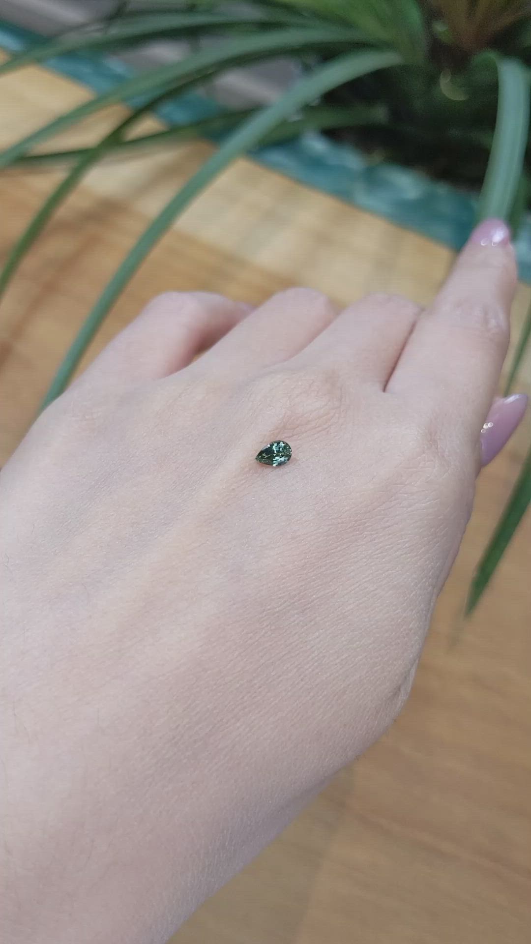 0.38 Ct. Bluish Green Sapphire from Madagascar Size Video