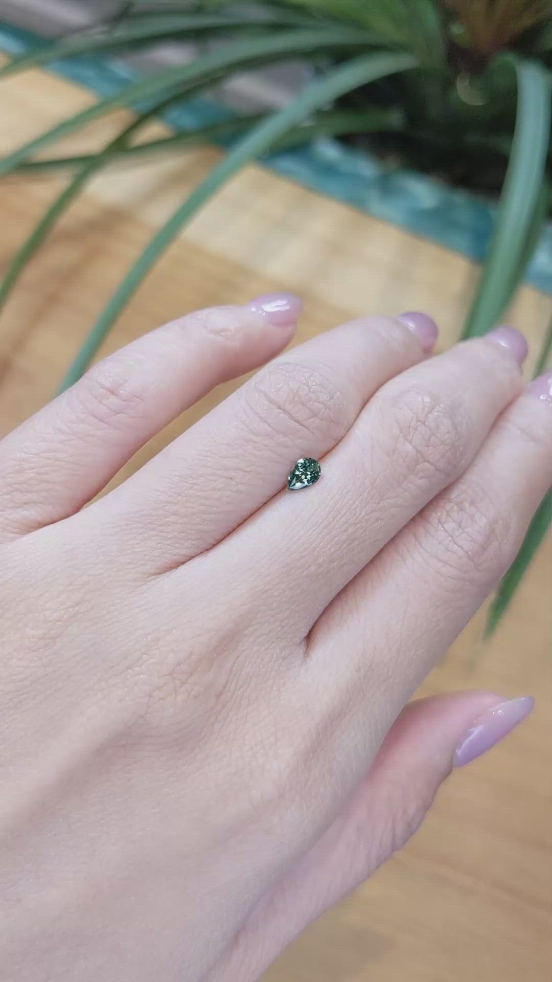 0.38 Ct. Bluish Green Sapphire from Madagascar Size Video