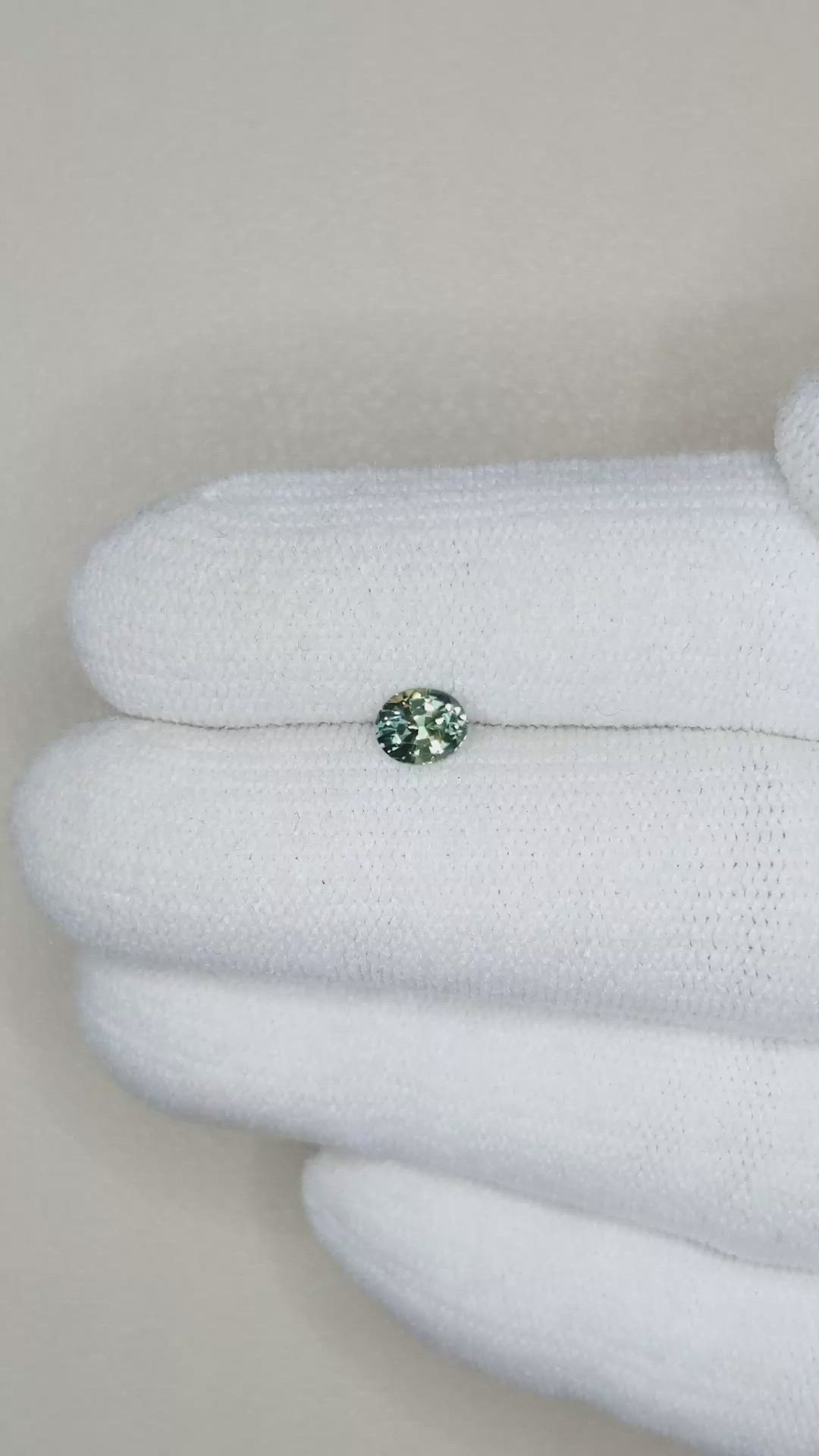 0.49 Ct. Bluish Green Sapphire from Madagascar Size Video