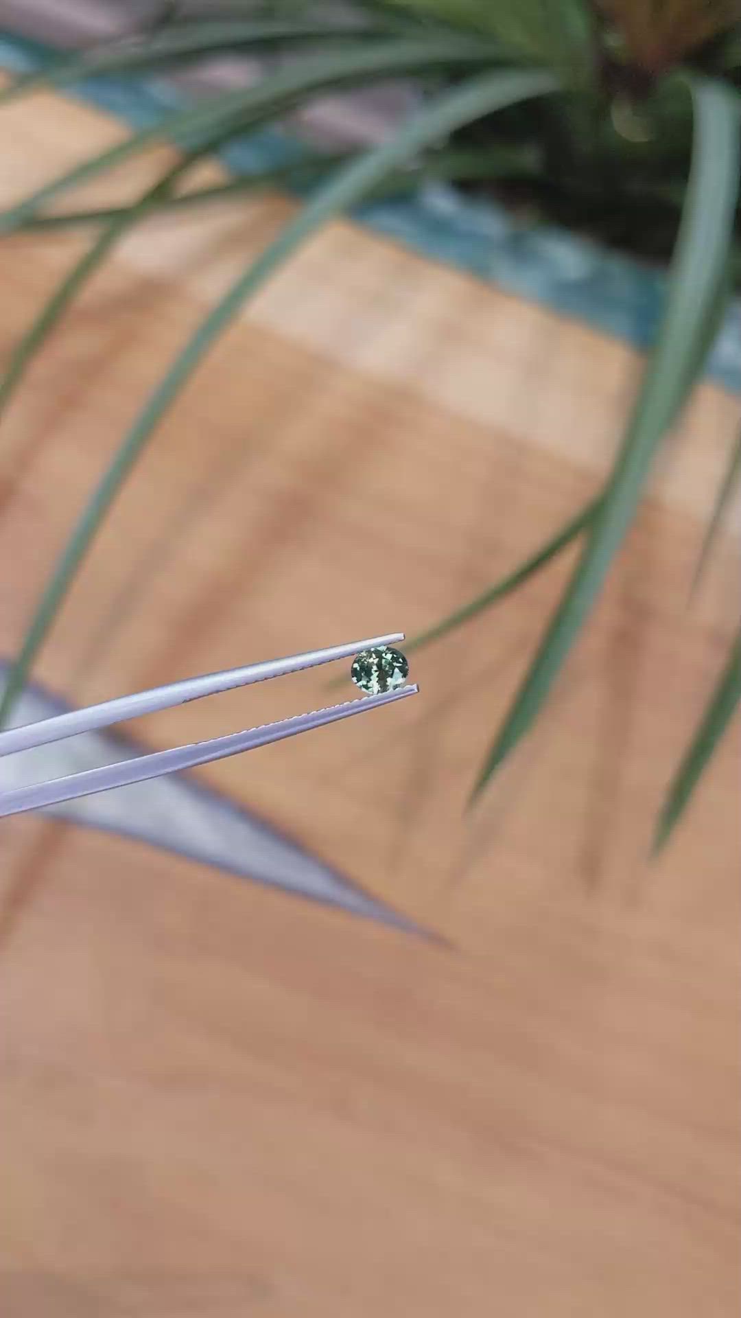 0.49 Ct. Bluish Green Sapphire from Madagascar Size Video