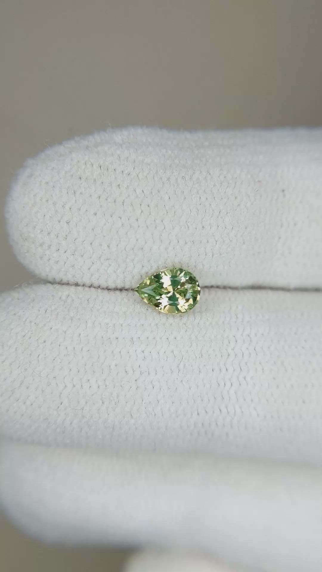 0.51 Ct. Yellowish Green Sapphire from Madagascar Size Video