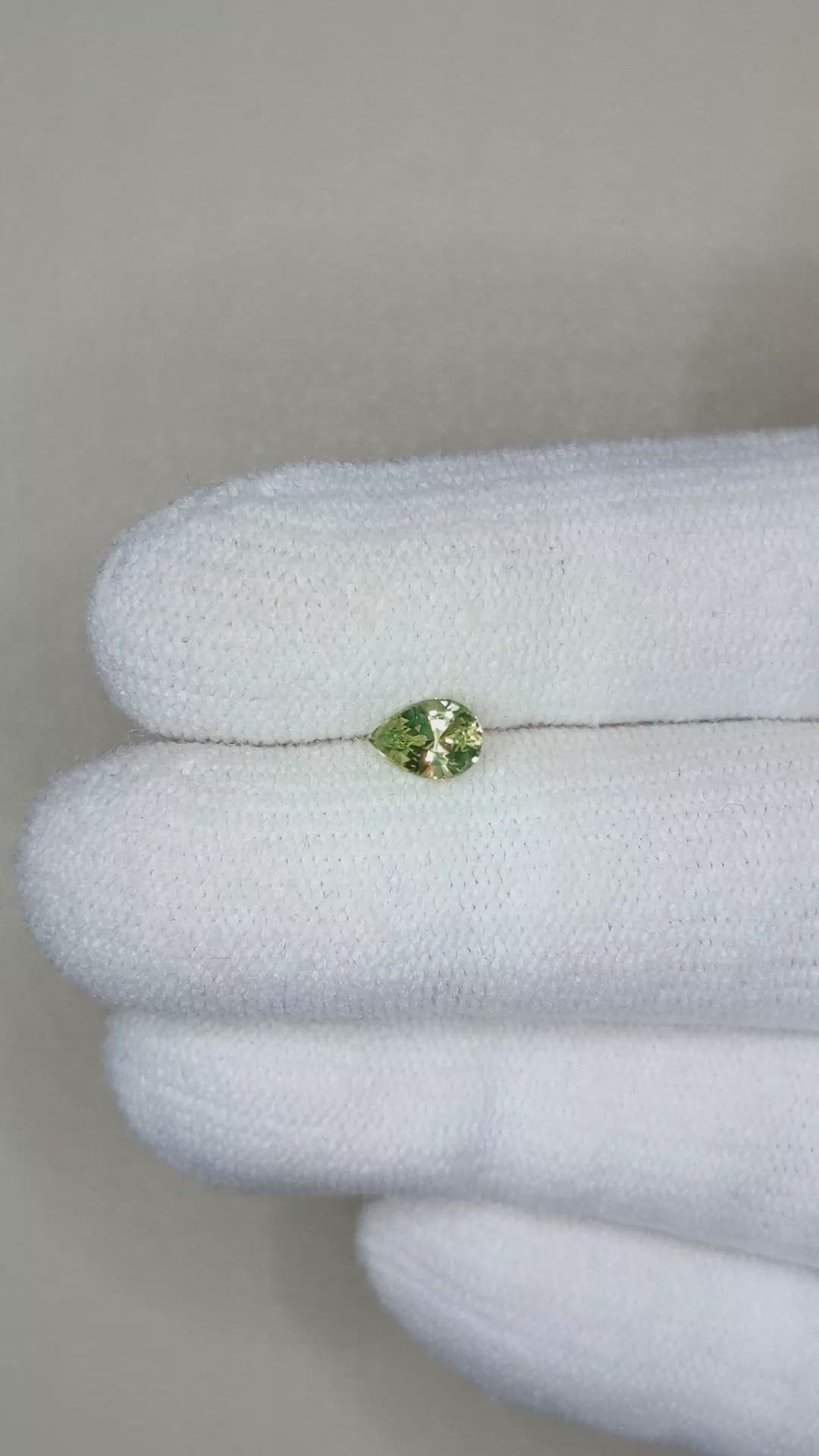 0.51 Ct. Yellowish Green Sapphire from Madagascar Size Video