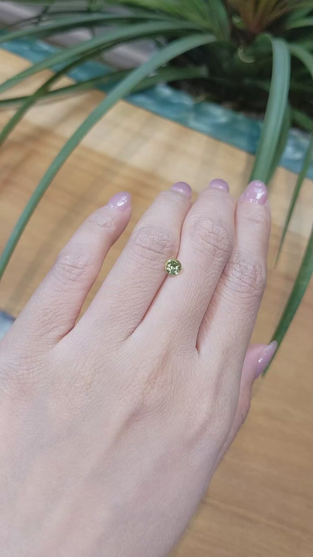 0.61 Ct. Yellowish Green Sapphire from Madagascar Size Video