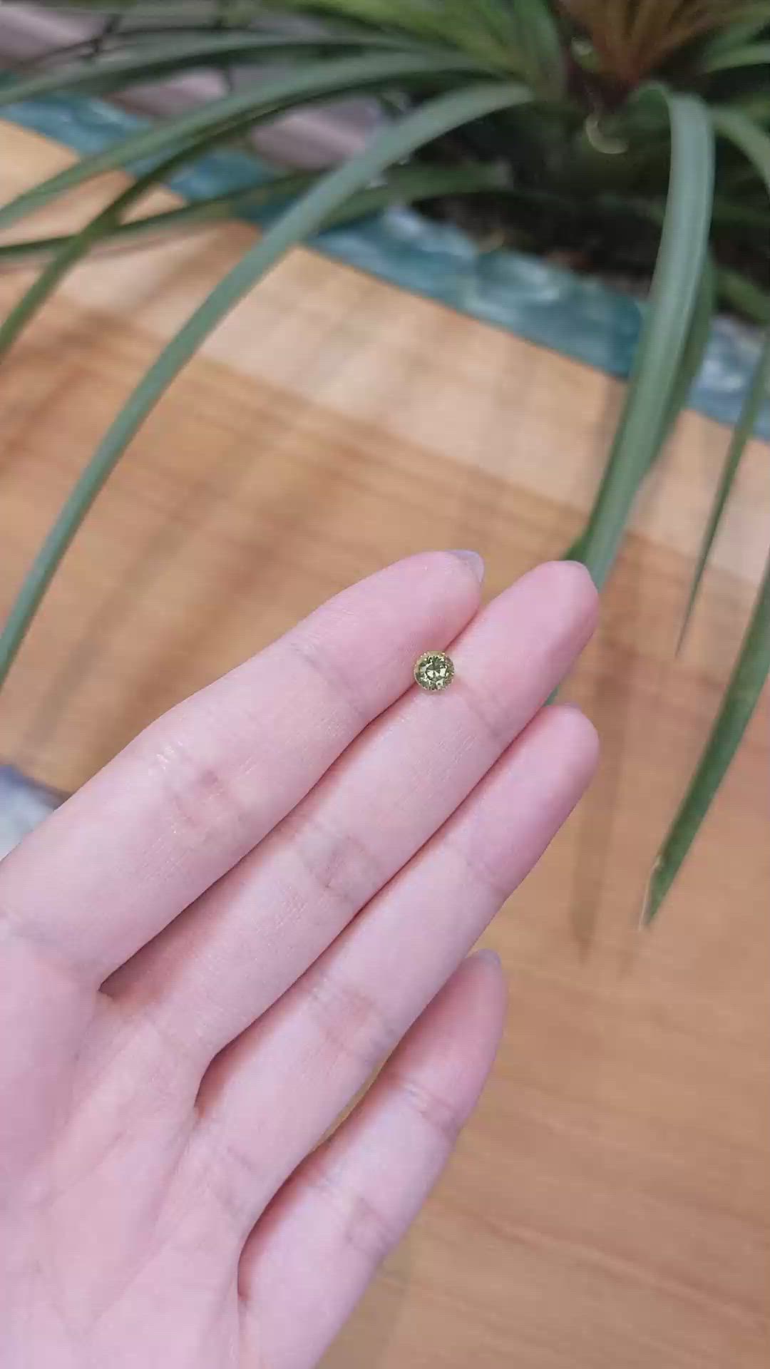 0.61 Ct. Yellowish Green Sapphire from Madagascar Size Video