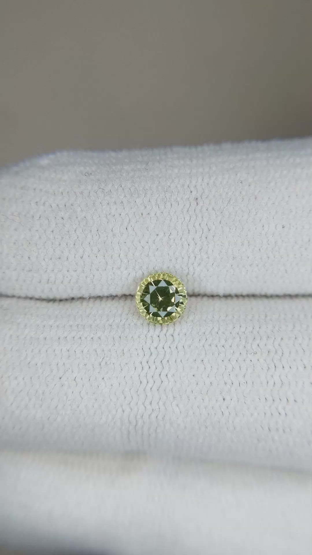 0.61 Ct. Yellowish Green Sapphire from Madagascar Size Video