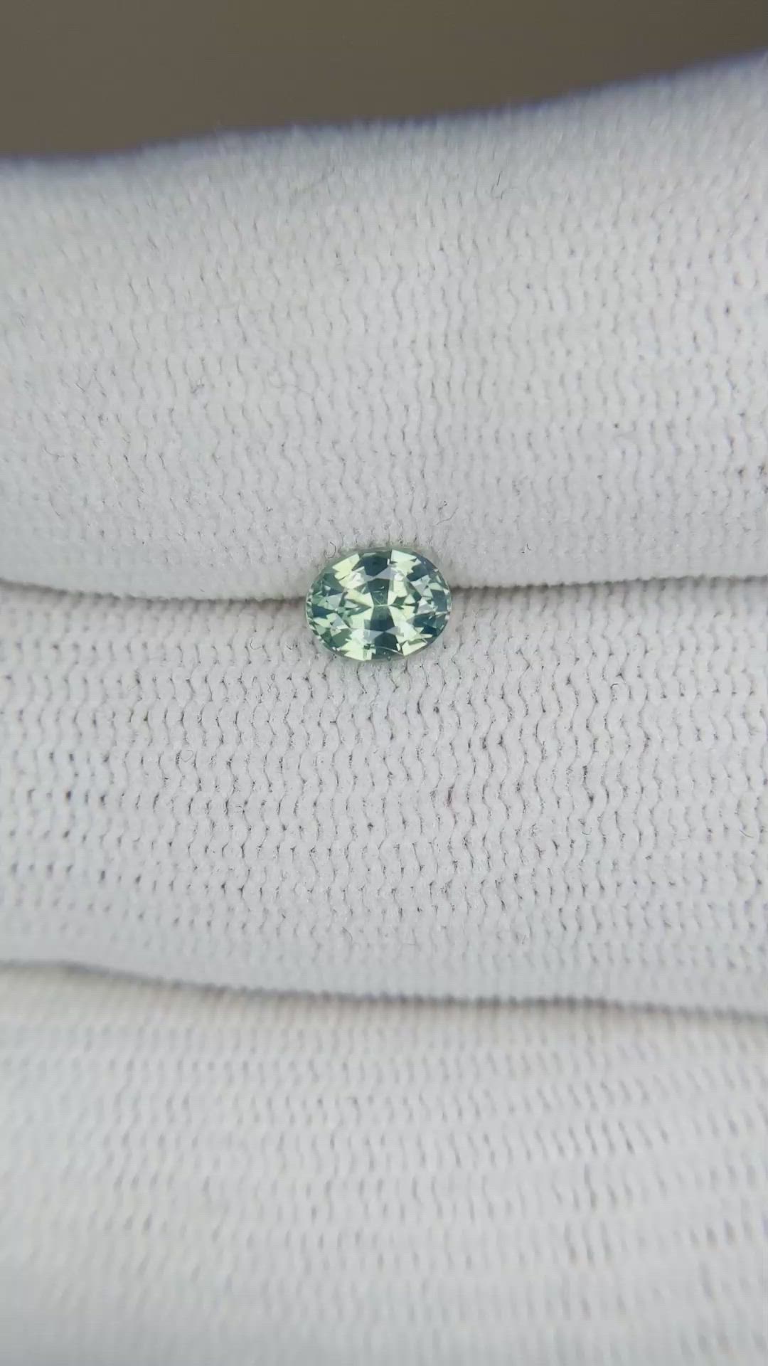 0.57 Ct. Bluish Green Sapphire from Madagascar Size Video