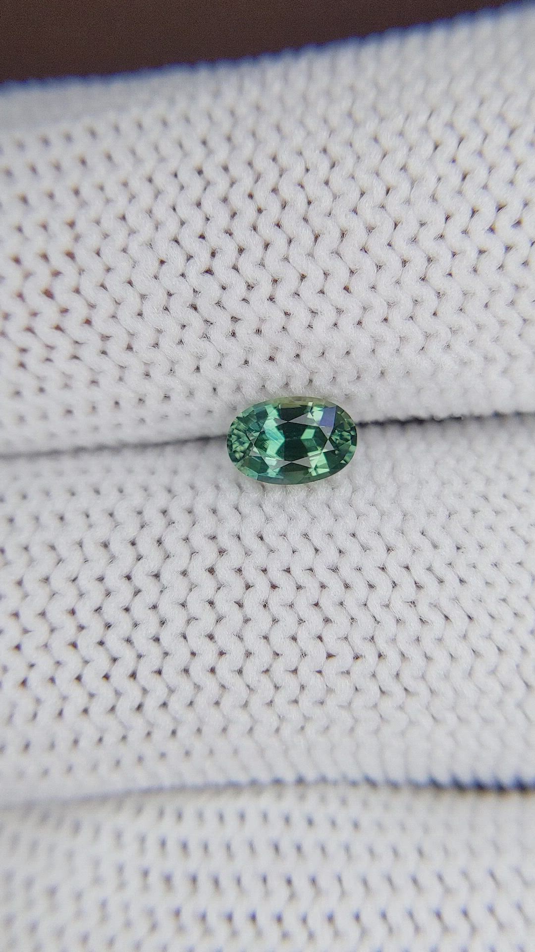 0.59 Ct. Bluish Green Sapphire from Madagascar Size Video