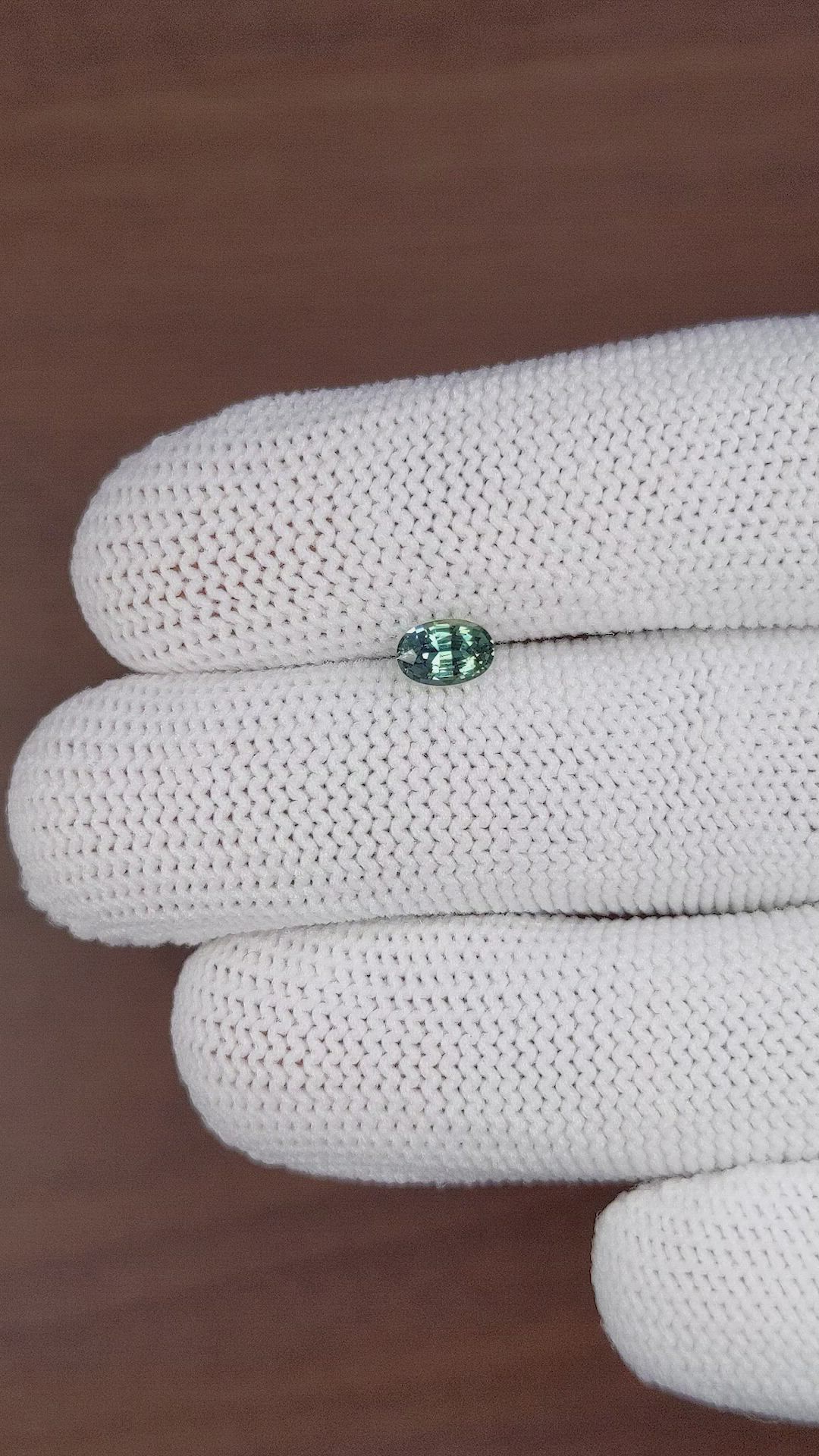 0.59 Ct. Bluish Green Sapphire from Madagascar Size Video