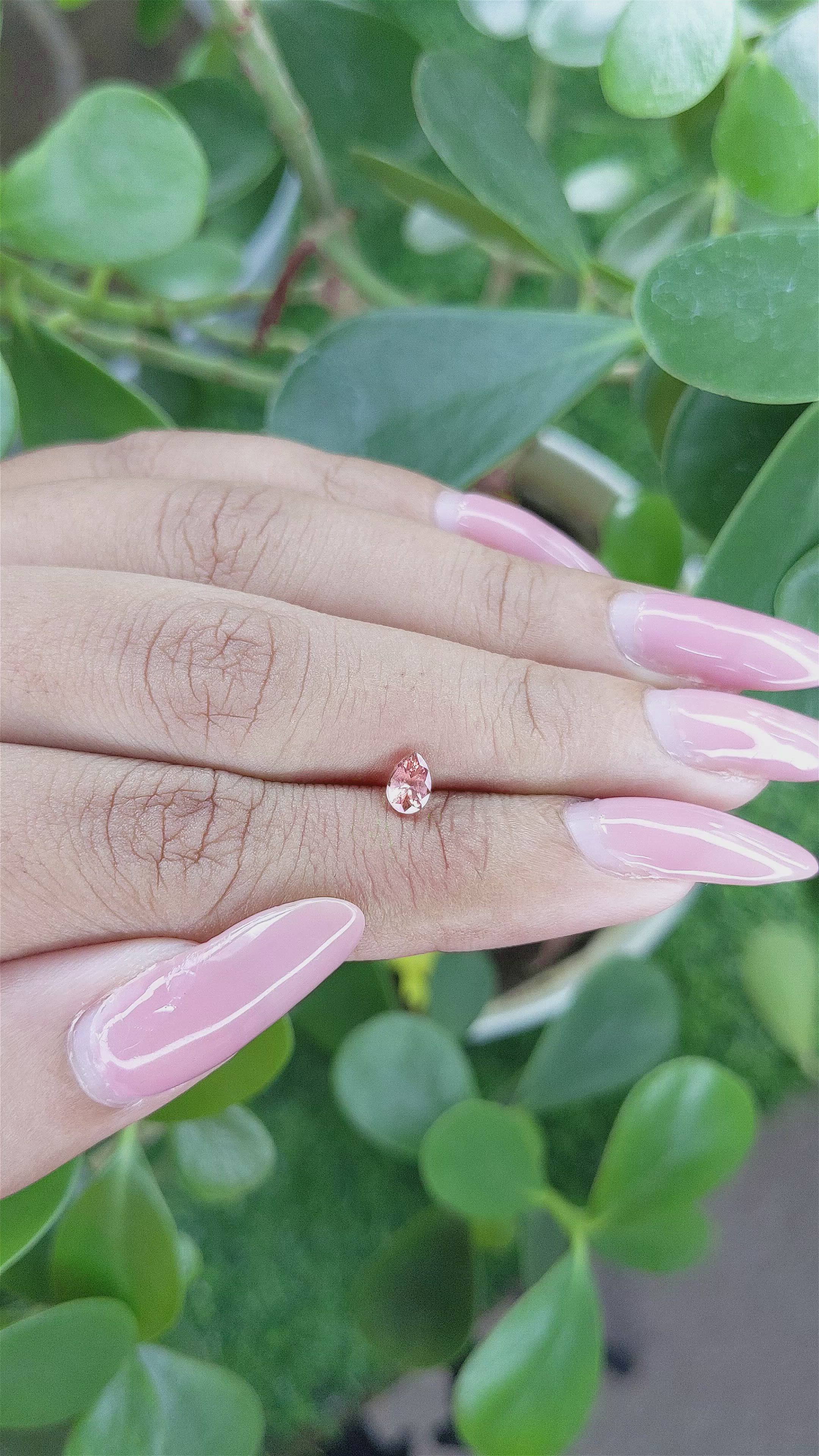 0.45 Ct. Pinkish Brown Sapphire from Madagascar Size Video