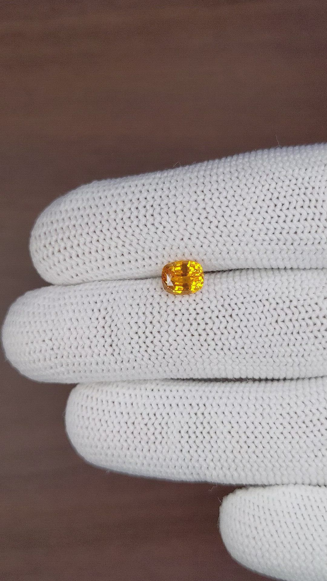 1.55 Ct. Orange Sapphire from Ceylon (Sri Lanka) Size Video