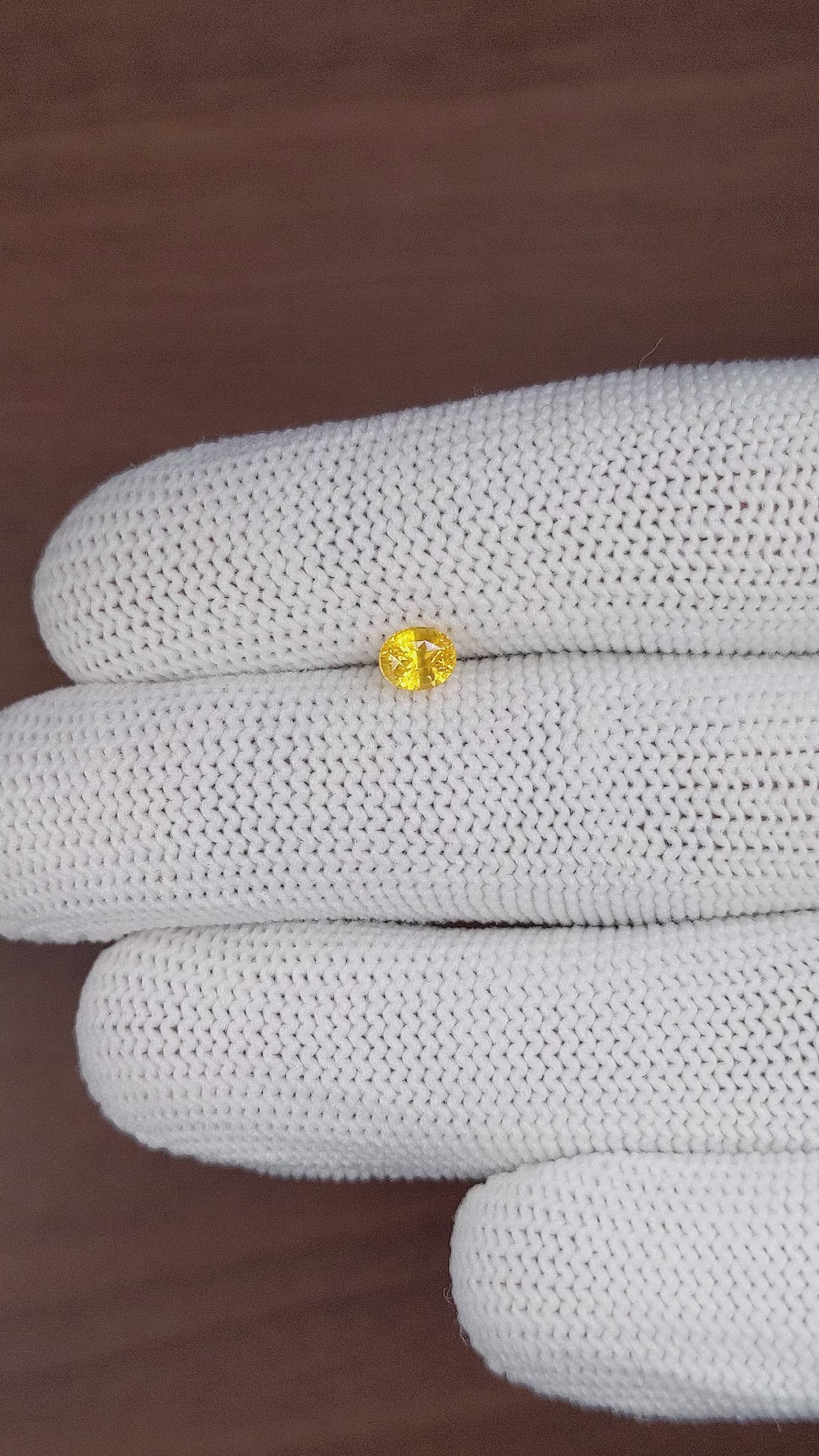 0.64 Ct. Yellow Sapphire from Ceylon (Sri Lanka) Size Video