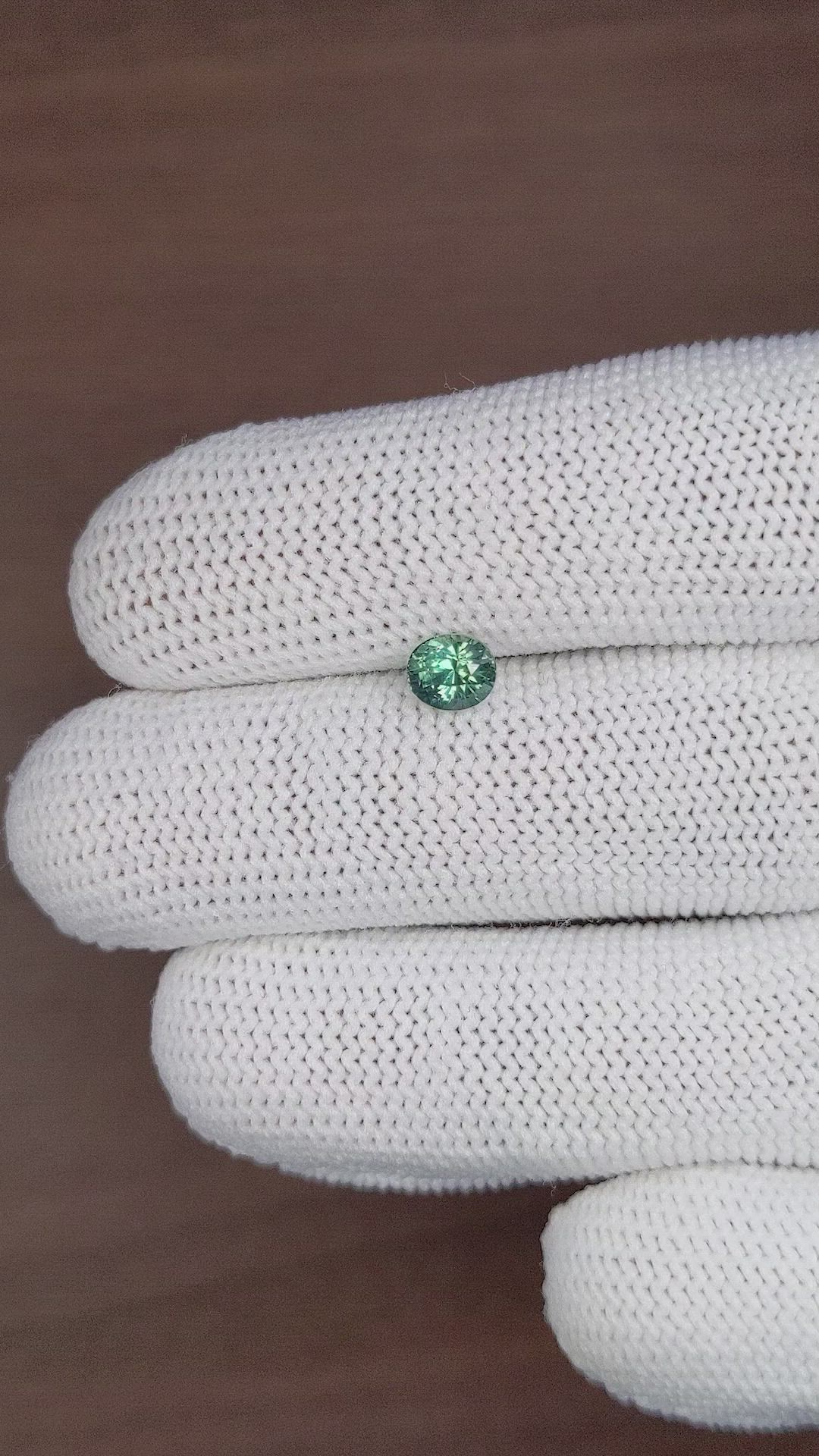 0.96 Ct. Bluish Green Sapphire from Madagascar Size Video