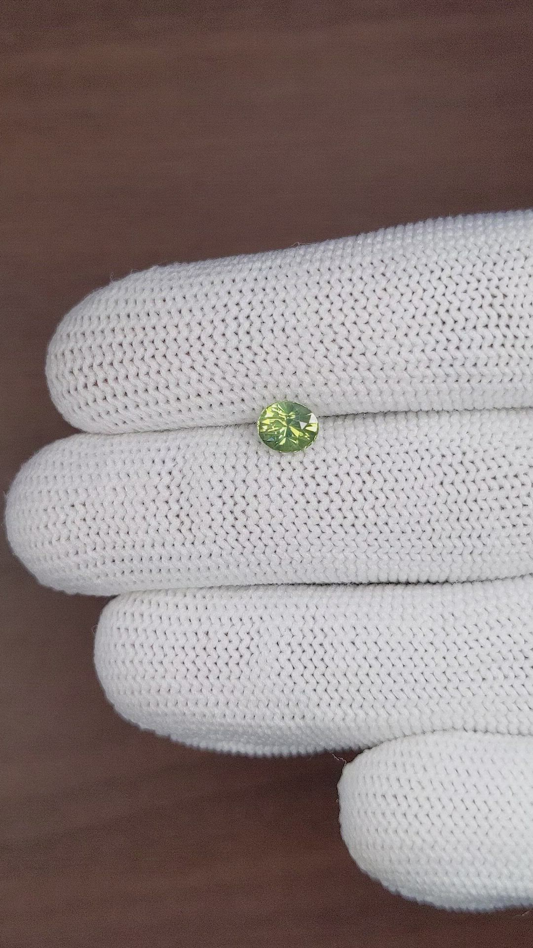 0.99 Ct. Yellowish Green Sapphire from Madagascar Size Video