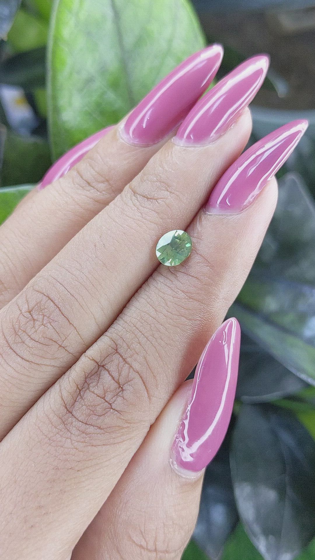 0.99 Ct. Yellowish Green Sapphire from Madagascar Size Video