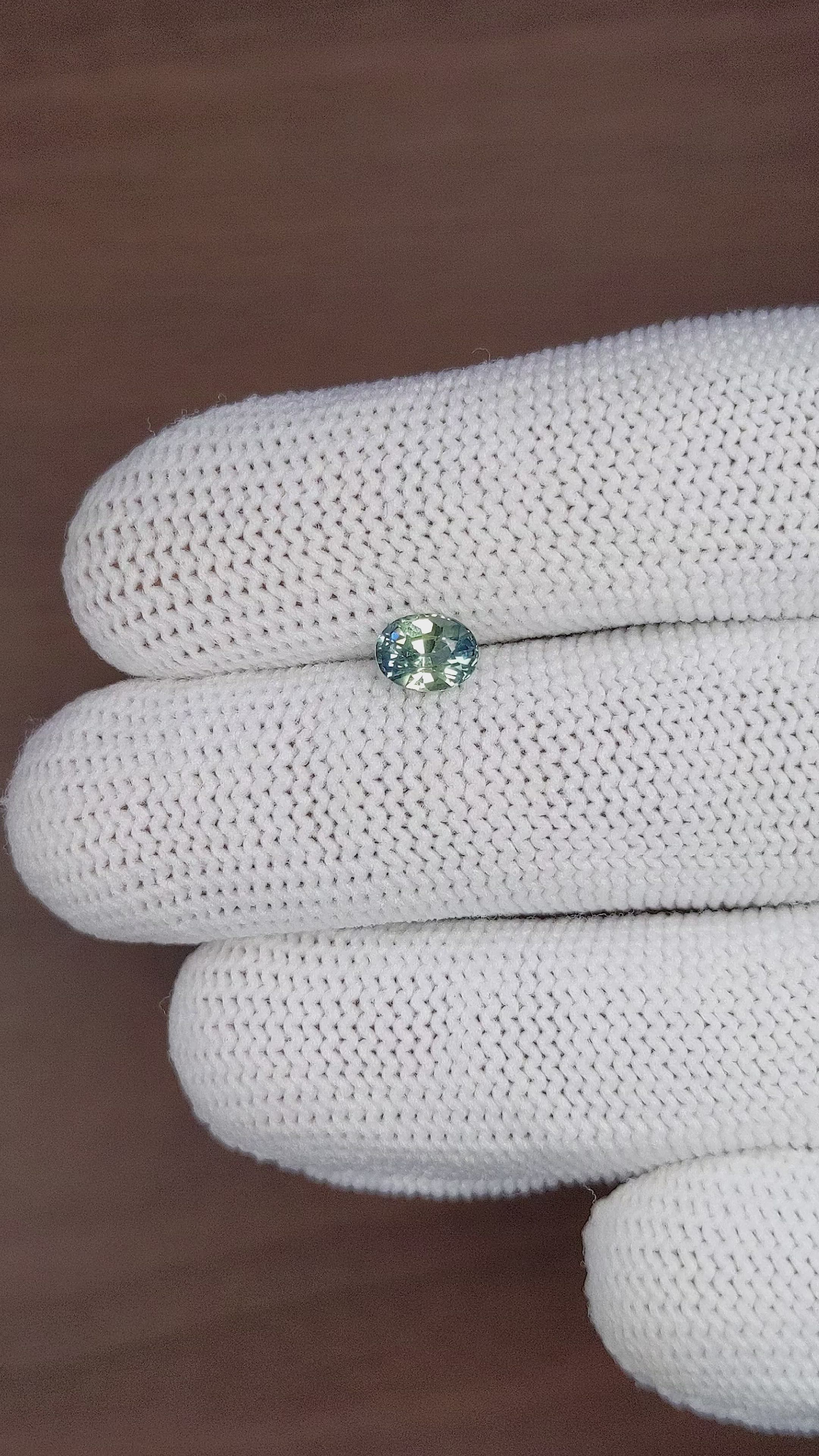 0.89 Ct. Bluish Green Sapphire from Madagascar Size Video