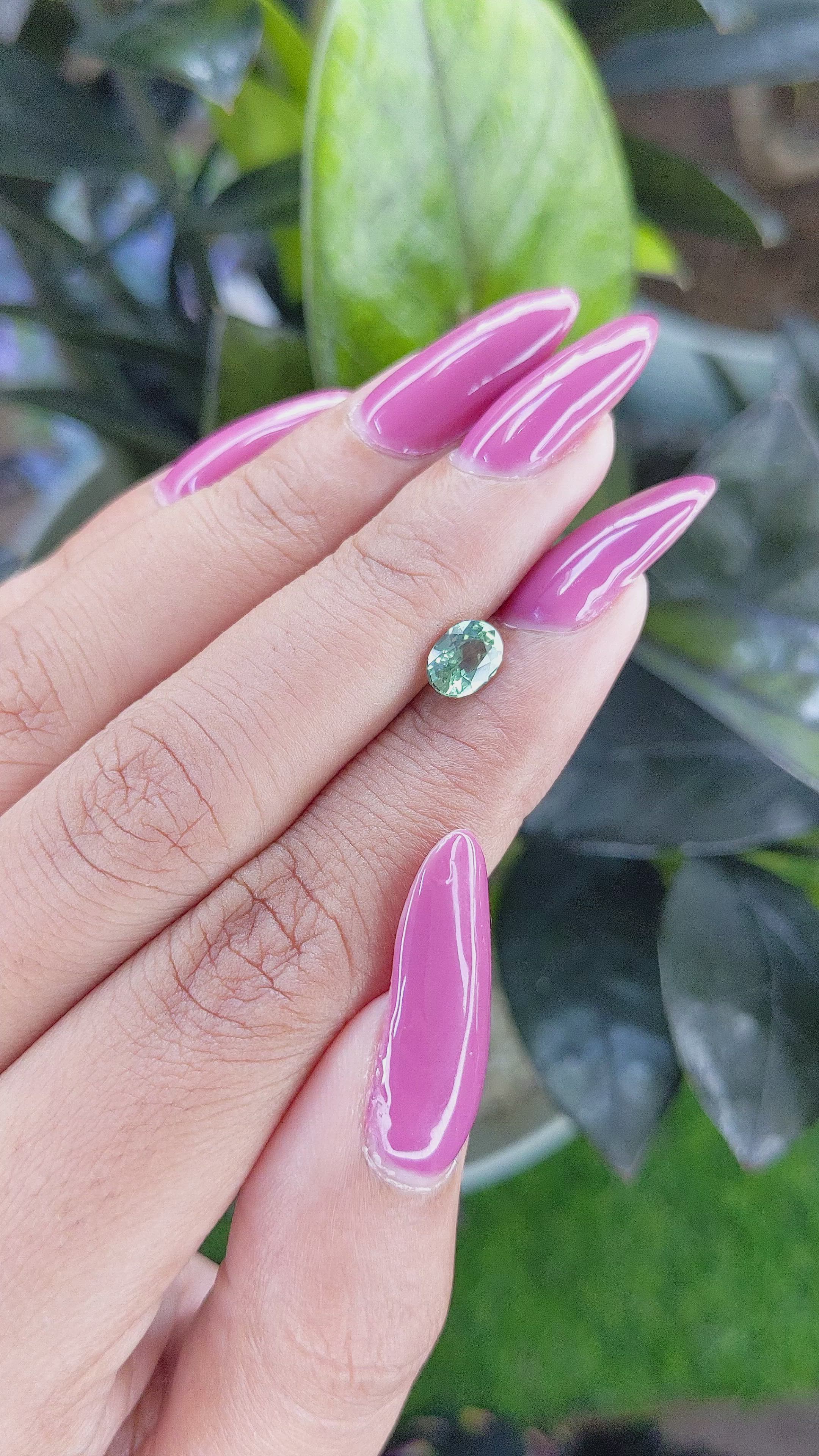 0.98 Ct. Bluish Green Sapphire from Madagascar Size Video