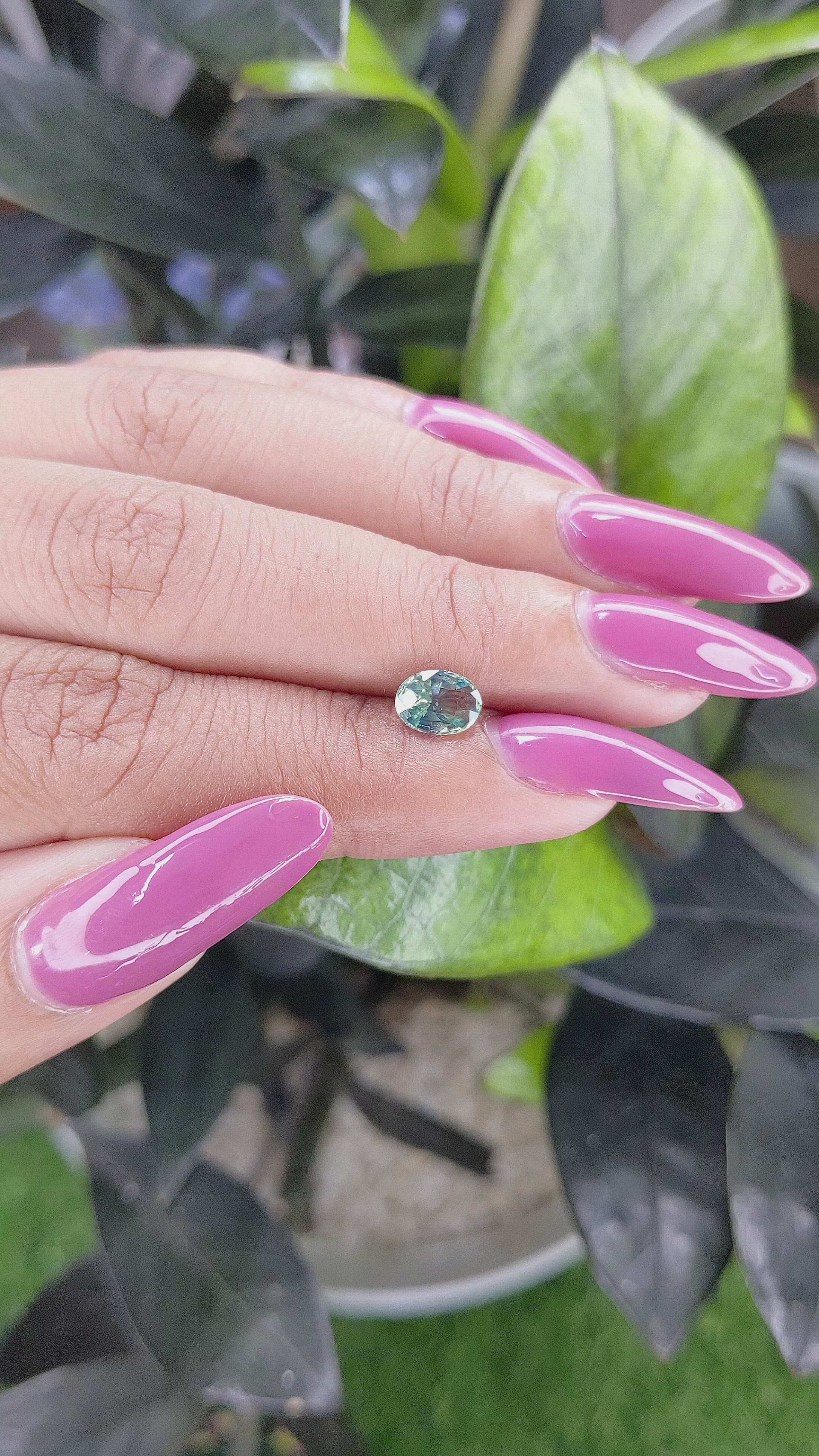 0.98 Ct. Bluish Green Sapphire from Madagascar Size Video