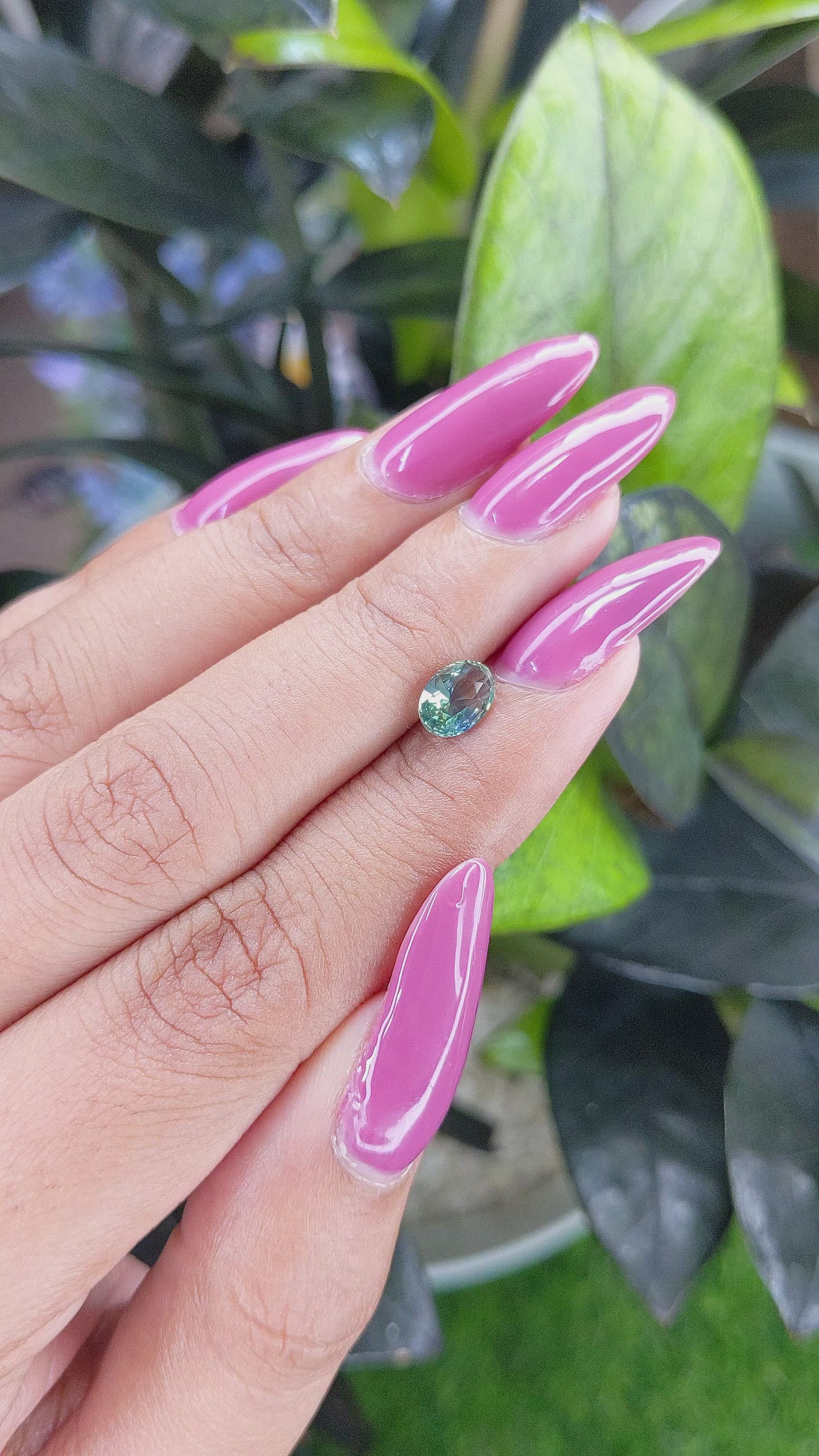 0.98 Ct. Bluish Green Sapphire from Madagascar Size Video