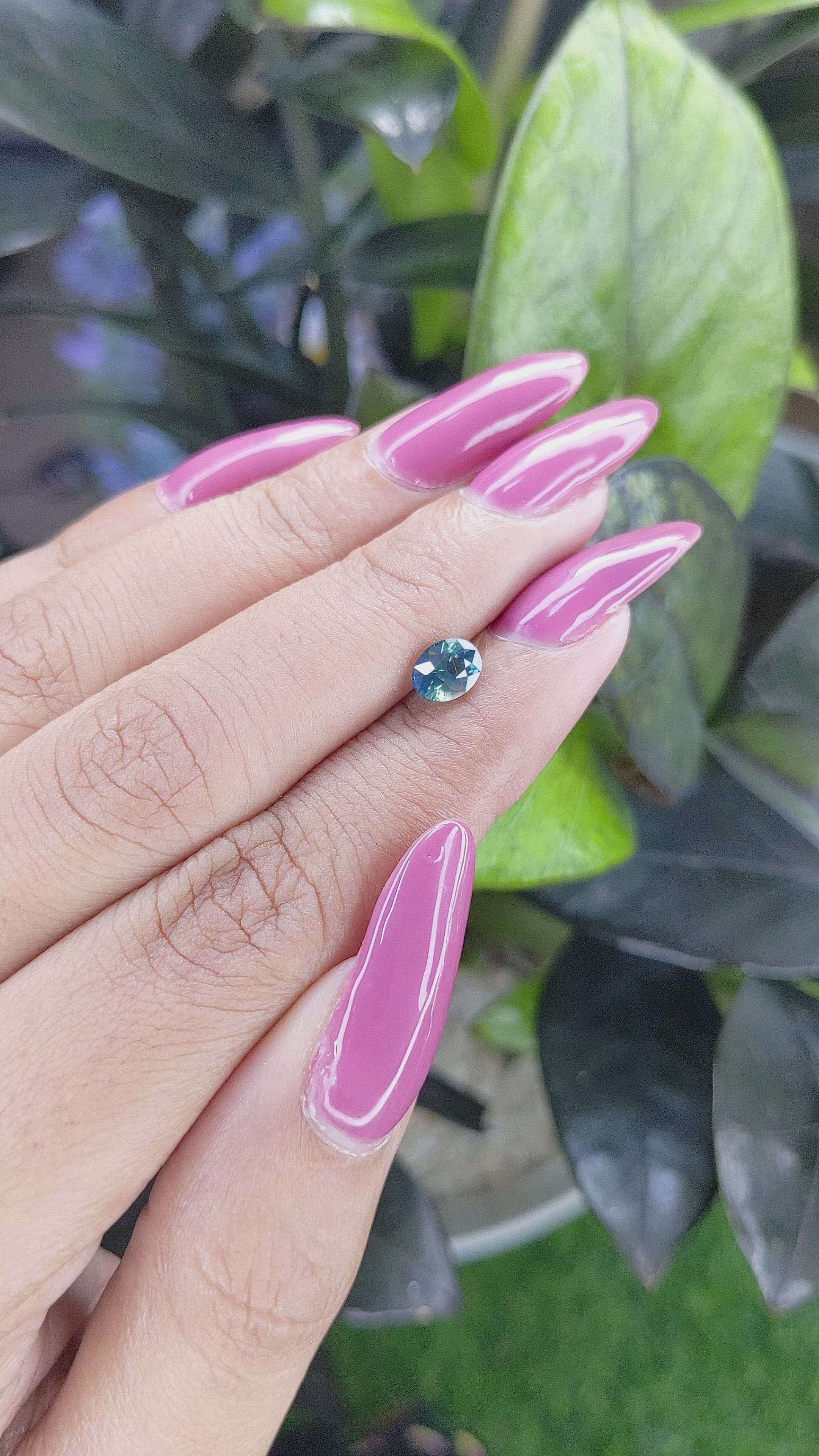 0.98 Ct. Bluish Green Sapphire from Madagascar Size Video