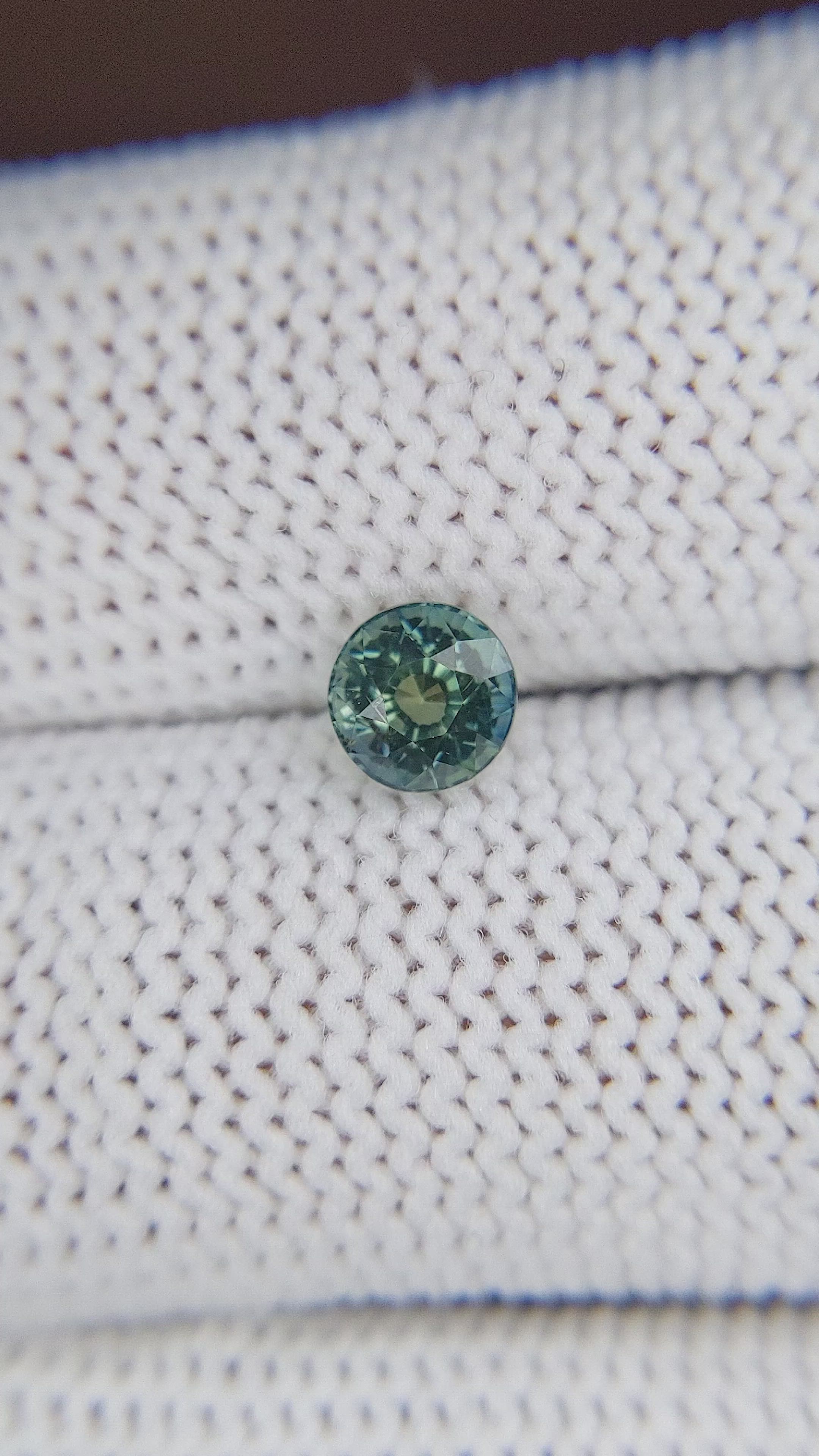 0.94 Ct. Bluish Green Sapphire from Madagascar Size Video