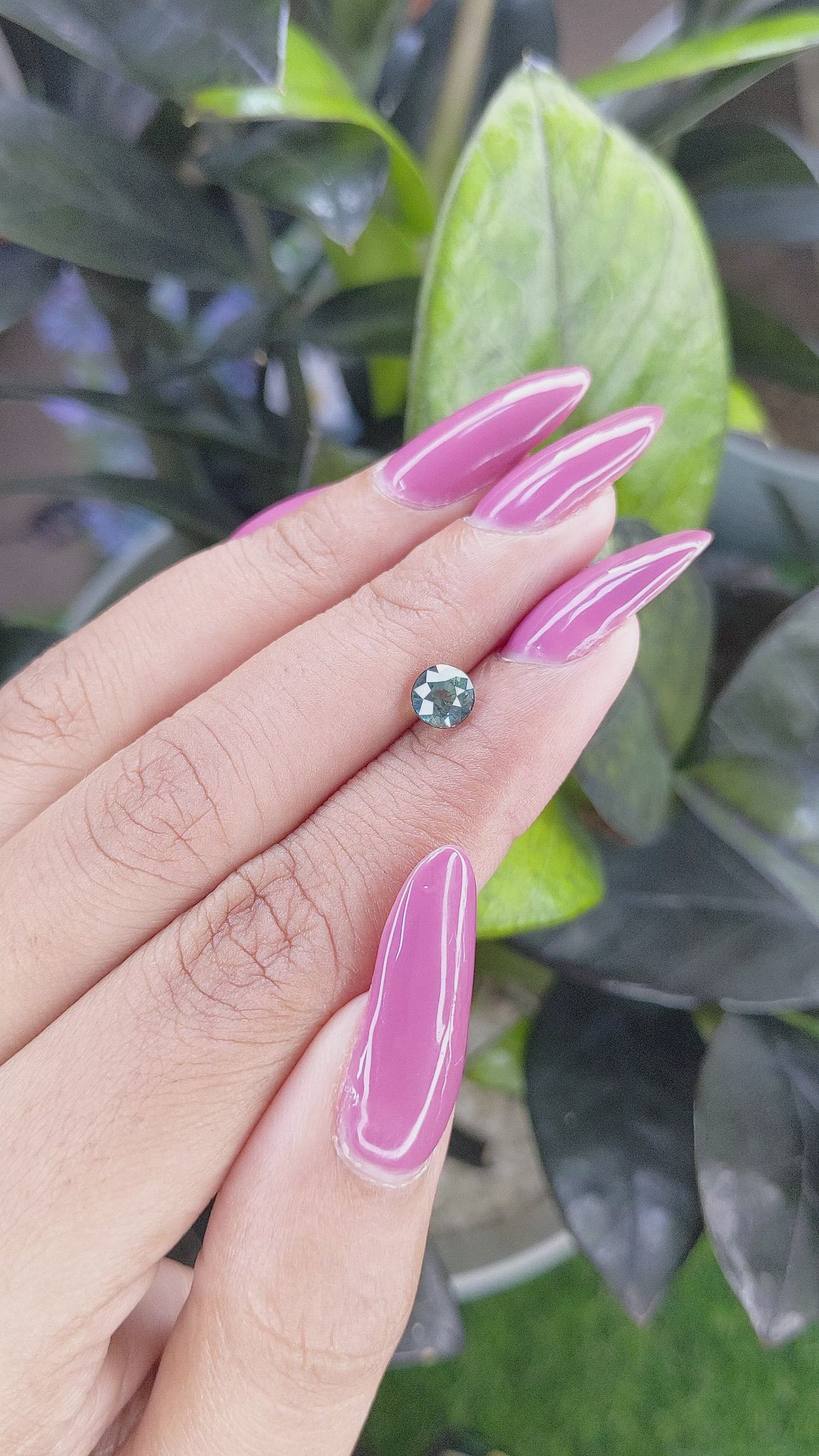 0.94 Ct. Bluish Green Sapphire from Madagascar Size Video