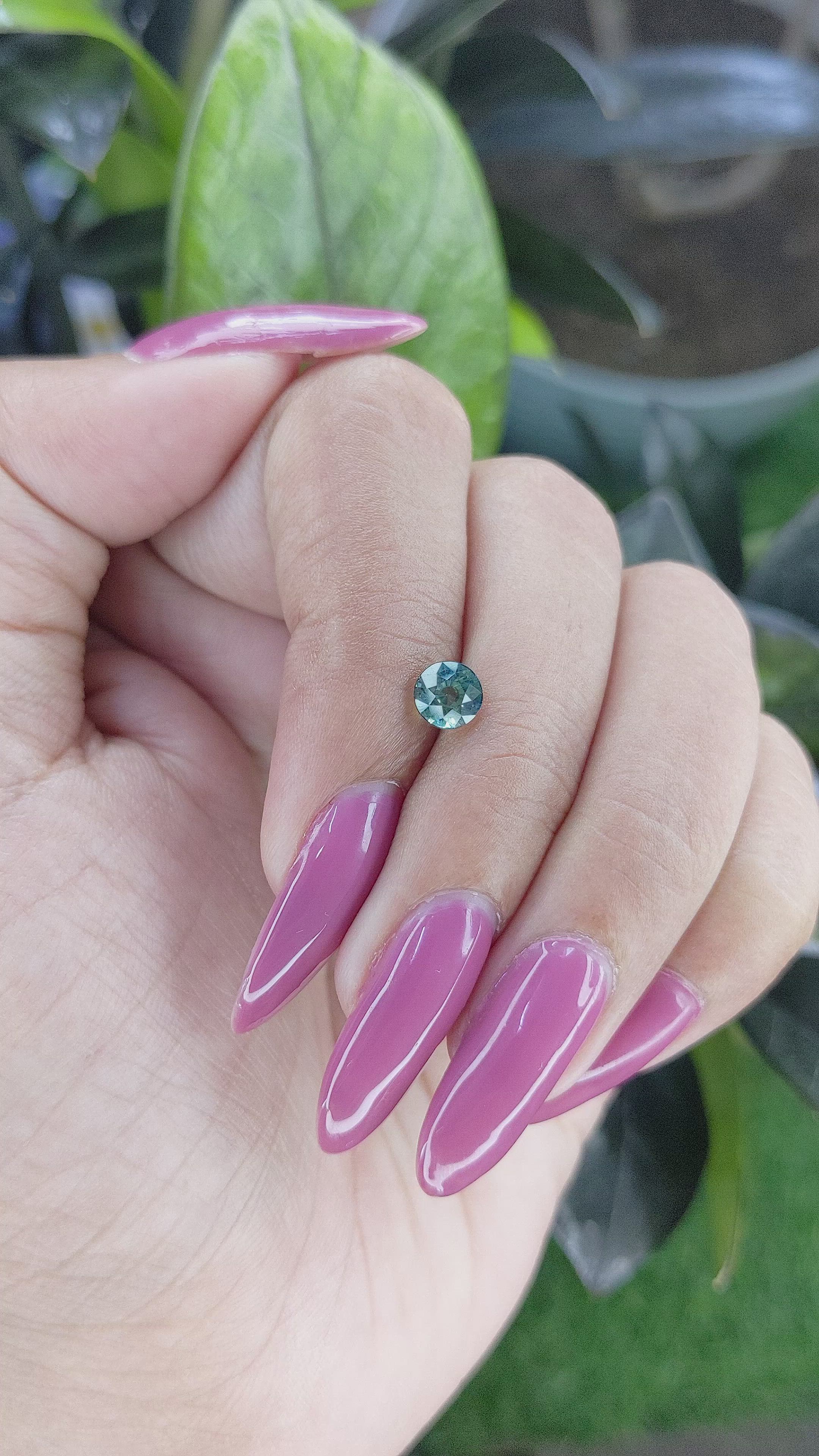 0.94 Ct. Bluish Green Sapphire from Madagascar Size Video