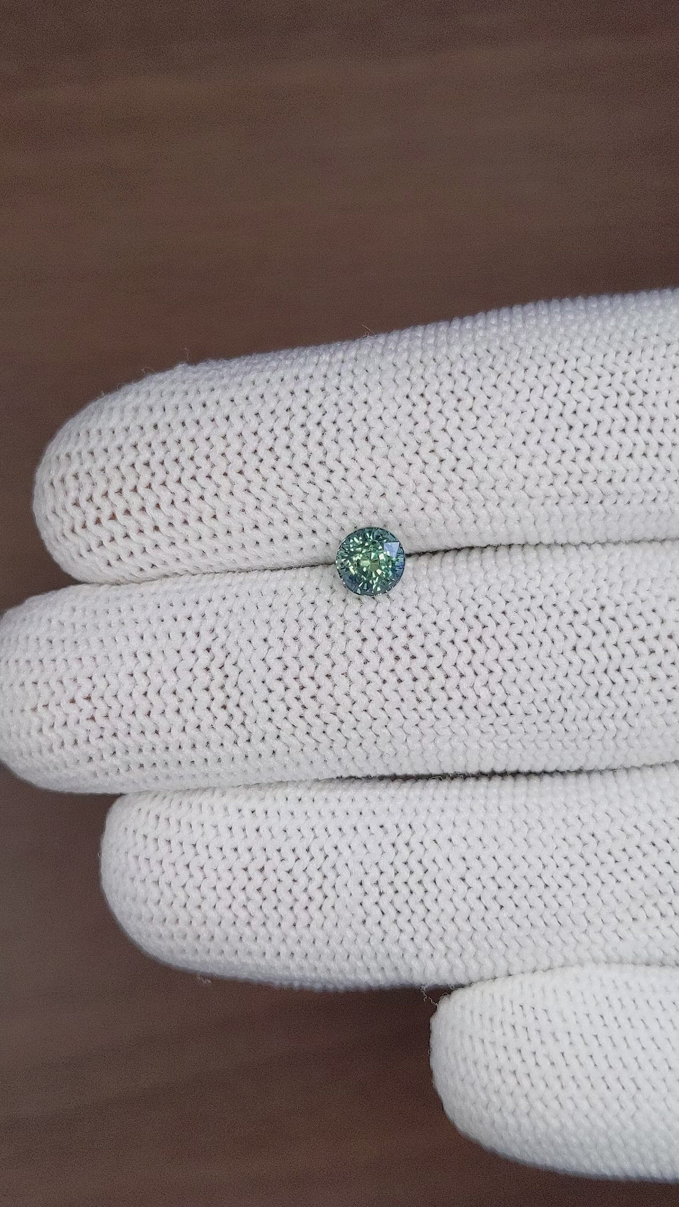 0.94 Ct. Bluish Green Sapphire from Madagascar Size Video