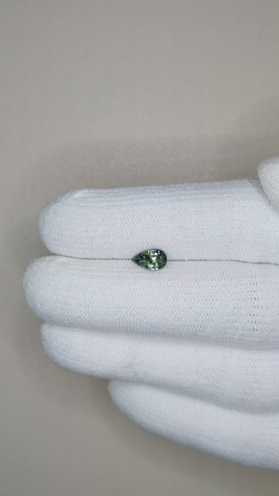 0.63 Ct. Bluish Green Sapphire from Madagascar Size Video