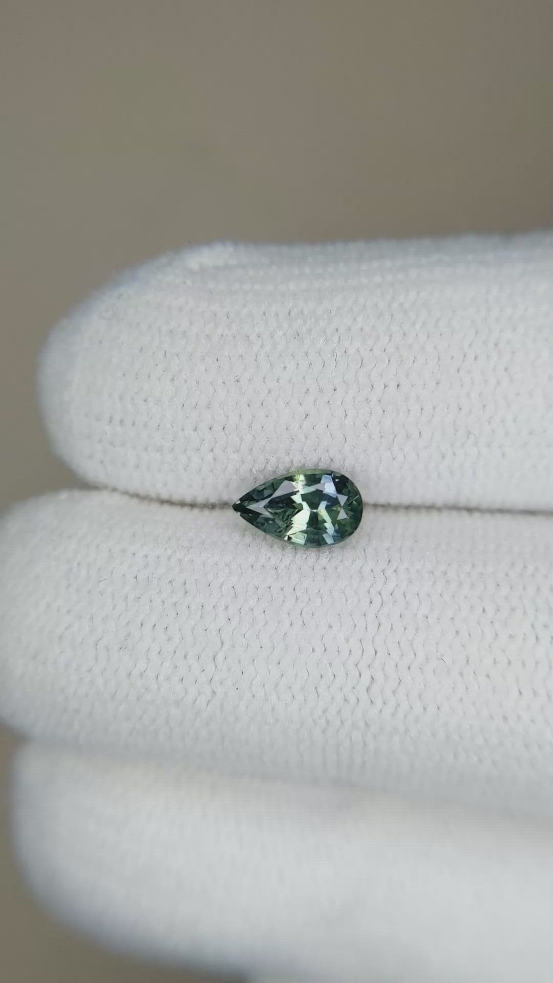 0.63 Ct. Bluish Green Sapphire from Madagascar Size Video