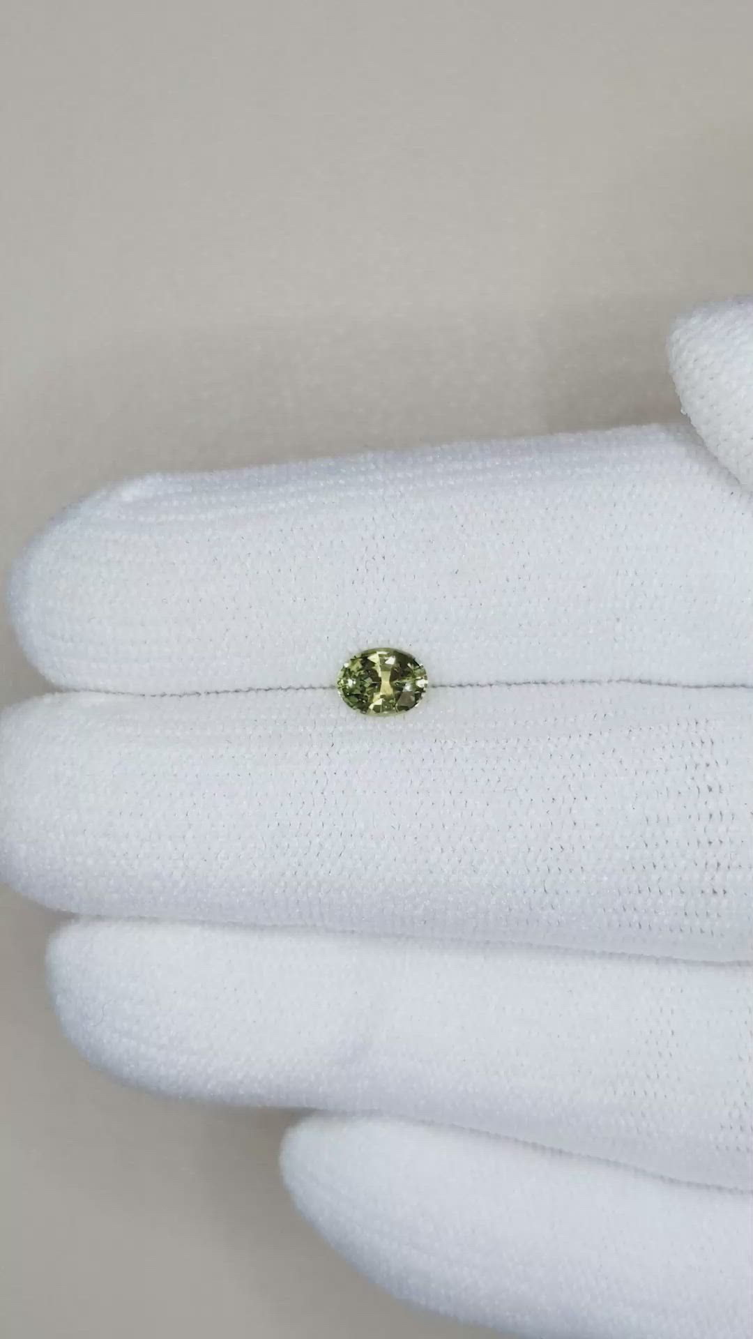 0.49 Ct. Yellowish Green Sapphire from Madagascar Size Video
