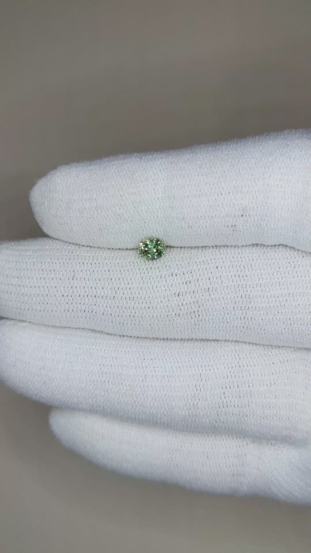 0.49 Ct. Yellowish Green Sapphire from Madagascar Size Video