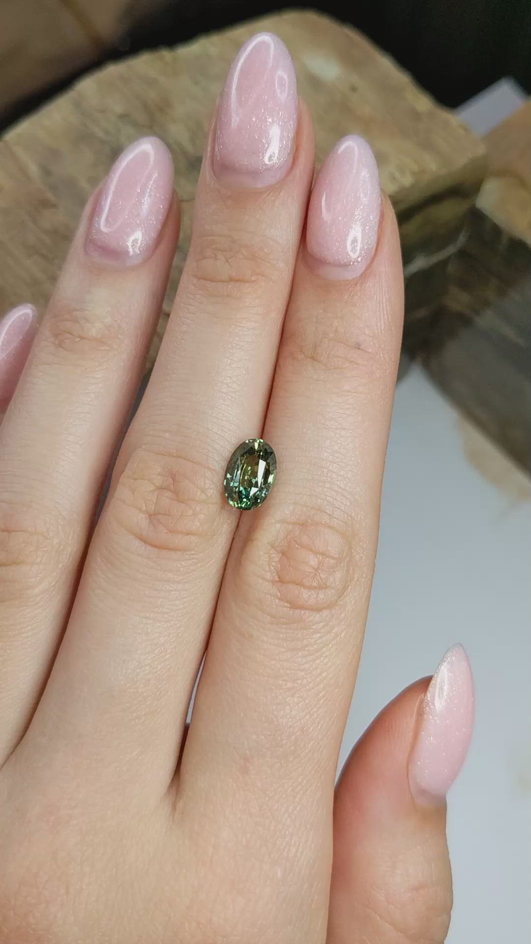 2.34 Ct. Yellowish Green Sapphire from Ceylon (Sri Lanka) Size Video