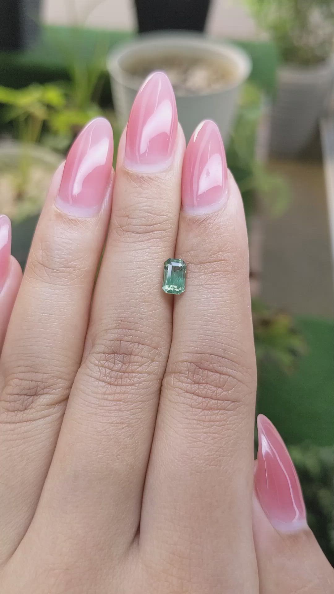 0.92 Ct. Yellowish Green Sapphire from Madagascar Size Video