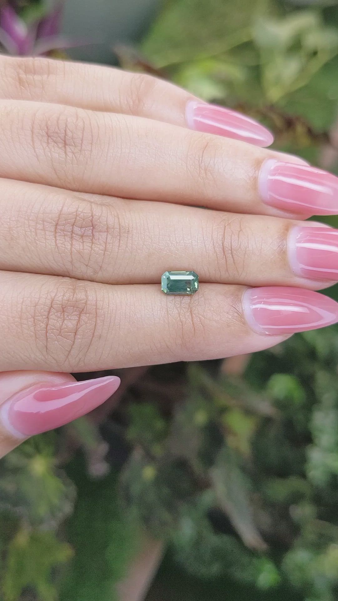 0.92 Ct. Yellowish Green Sapphire from Madagascar Size Video