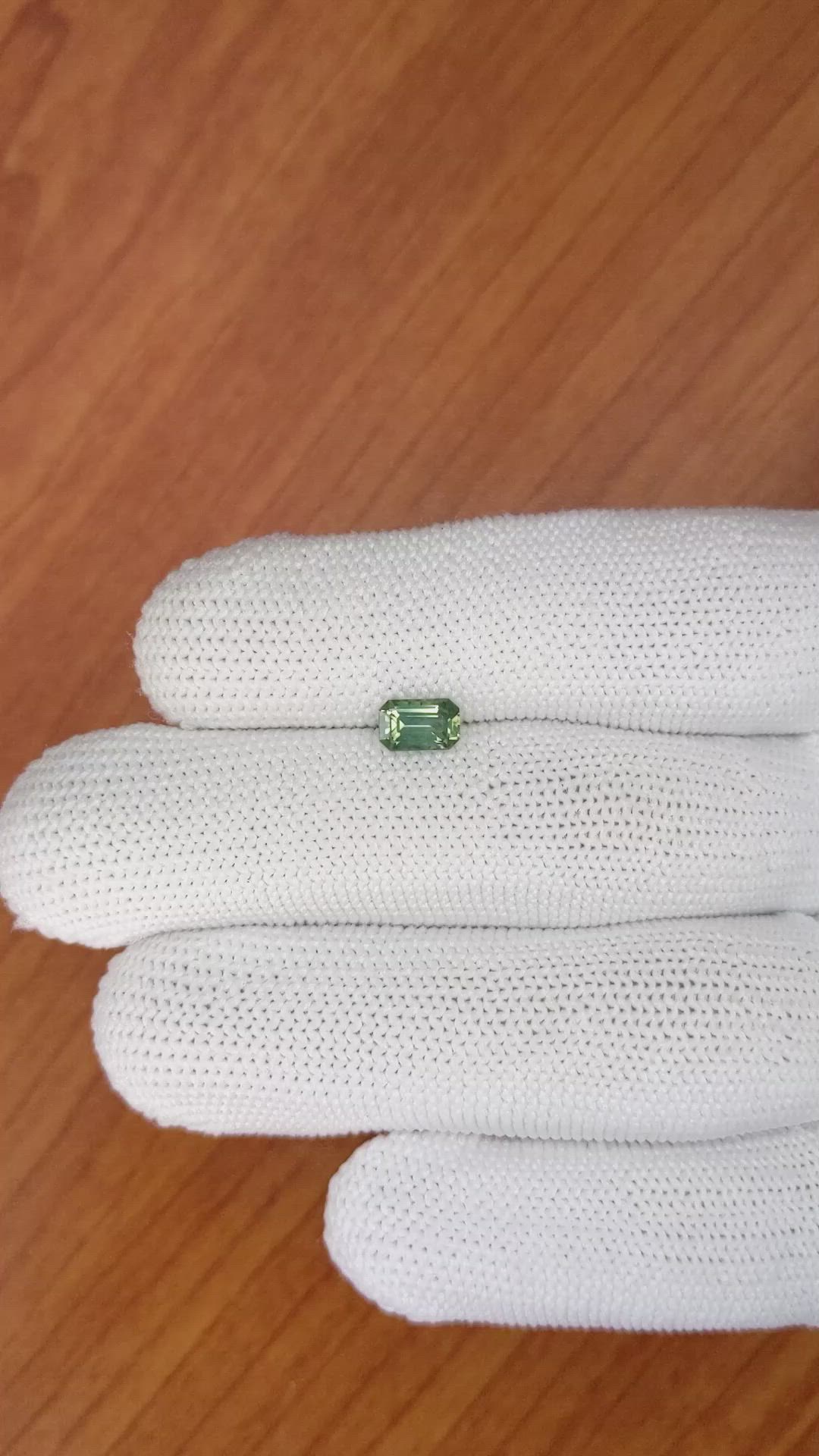 0.92 Ct. Yellowish Green Sapphire from Madagascar Size Video