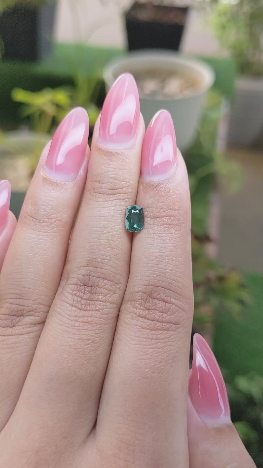 0.95 Ct. Bluish Green Sapphire from Madagascar Size Video